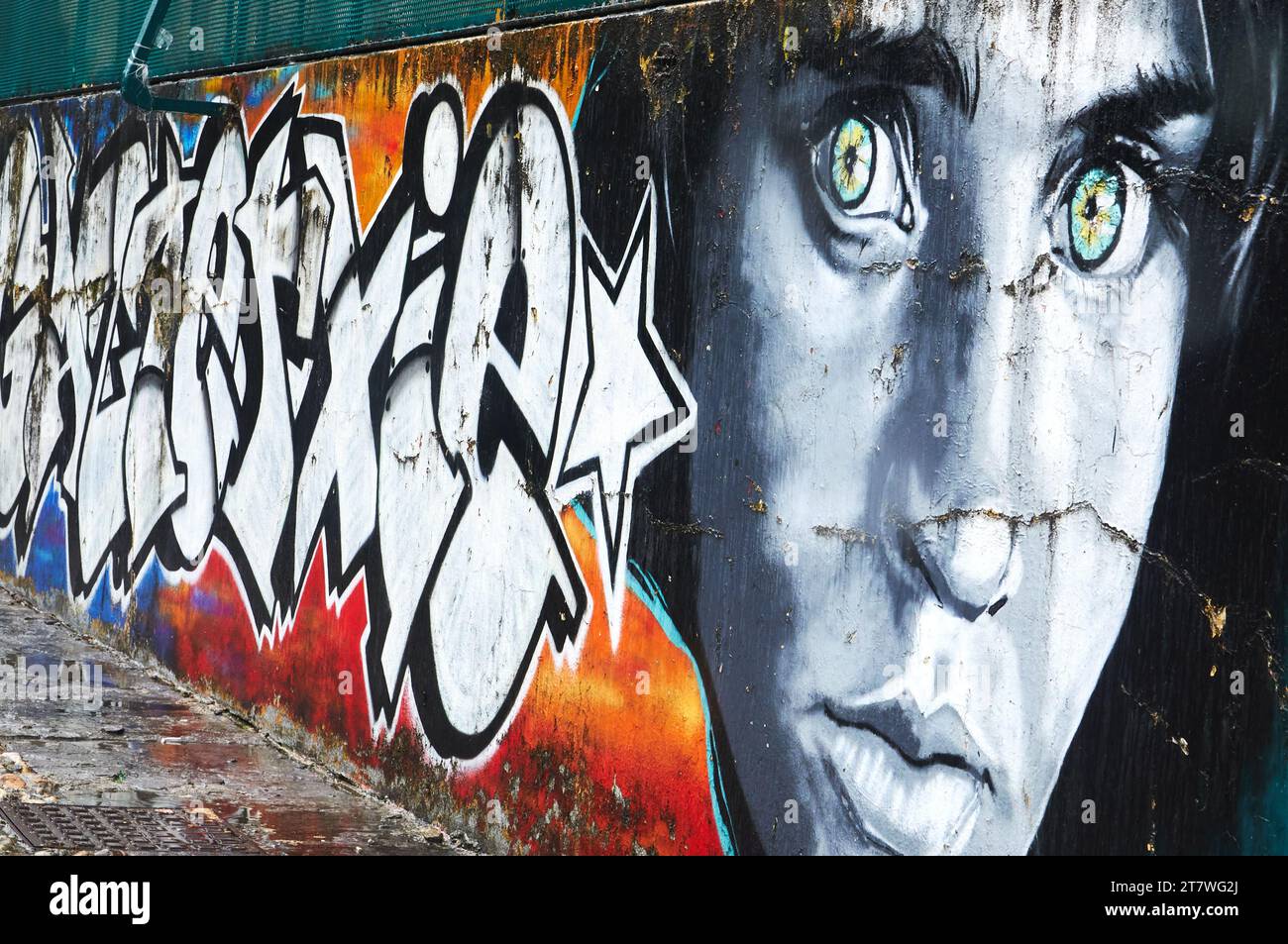 A vivid graffiti rendition of an iconic National Geographic magazine cover transforms urban spaces Stock Photo