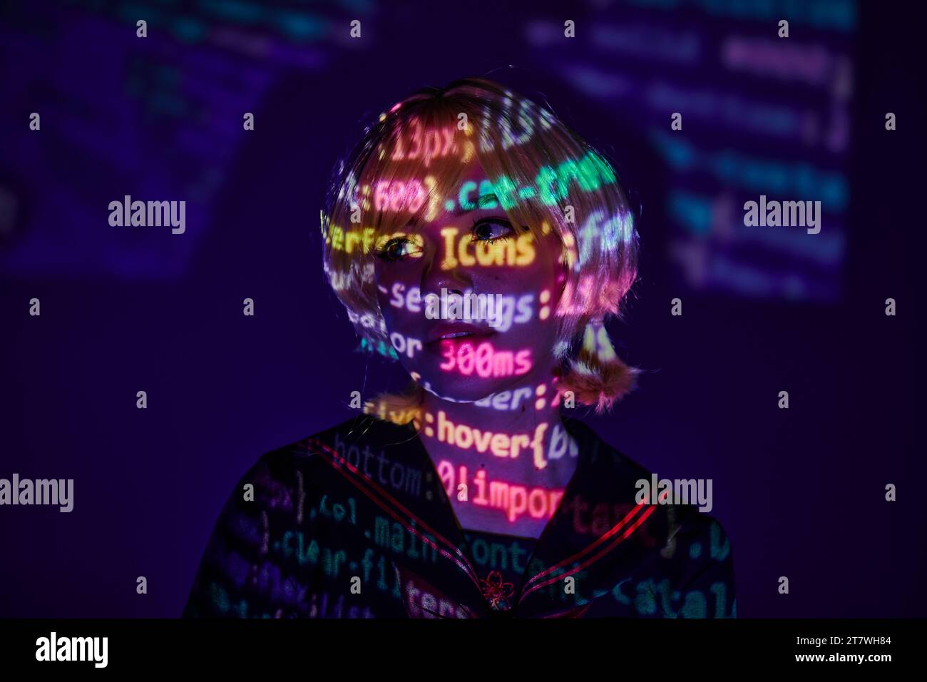 portrait of young anime woman in colorful neon programming symbols ...