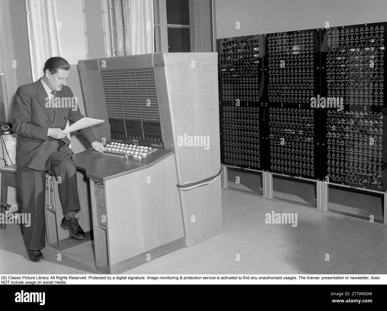 BARK computer. Binary Arithmetic (Automatic) Relay Calculator'. An early 1950s electromechanical computer. BARK was inaugurated on 28 April 1950, was in operation until July 1955  It could perform addition in 150 ms and multiplication in 250 ms. It had a memory with 50 registers and 100 constants. It was later expanded to double the memory. Howard Aiken (american physicist, pioneer in computing, IBM conceptual designer) stated in reference to BARK 'This is the first computer I have seen outside Harvard that actually works.' The construction of the BARK computer was led by Conny Palm, an electr Stock Photo