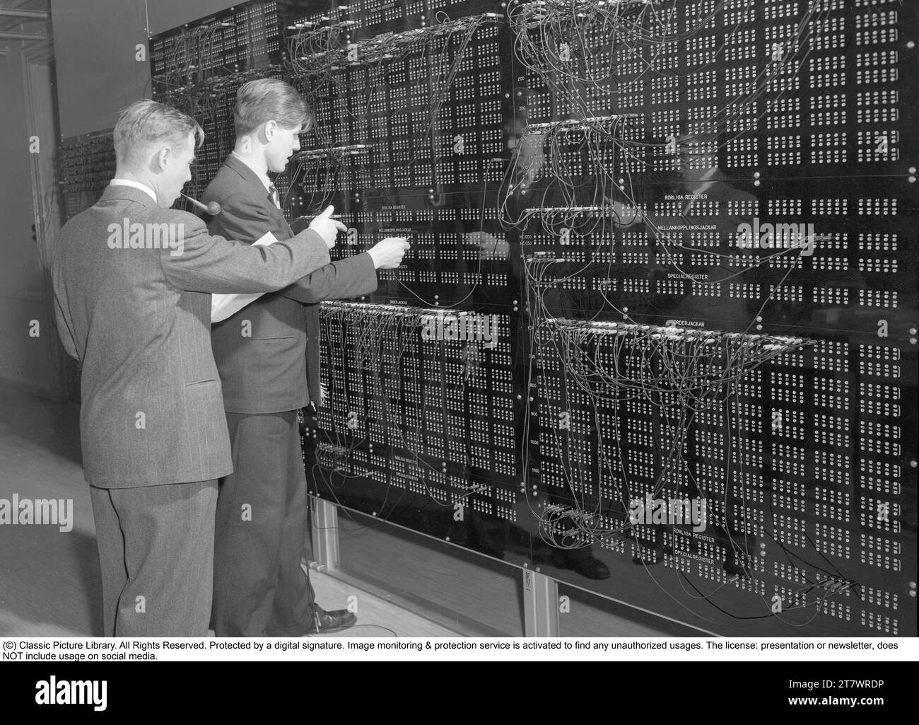 BARK computer. Binary Arithmetic (Automatic) Relay Calculator'. An early 1950s electromechanical computer. BARK was inaugurated on 28 April 1950, was in operation until July 1955  It could perform addition in 150 ms and multiplication in 250 ms. It had a memory with 50 registers and 100 constants. It was later expanded to double the memory. Howard Aiken (american physicist, pioneer in computing, IBM conceptual designer) stated in reference to BARK 'This is the first computer I have seen outside Harvard that actually works.' The construction of the BARK computer was led by Conny Palm, an electr Stock Photo