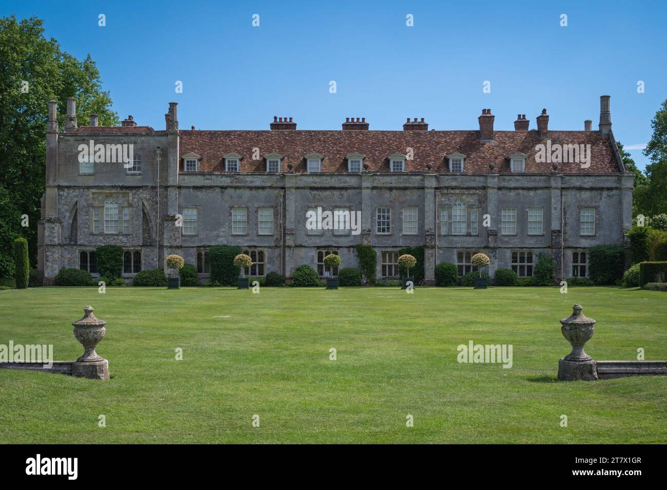 View of Mottisfont House looking across the North Lawns on a bright summers day in 2022. Mottisfont, Hampshire, England, UK Stock Photo