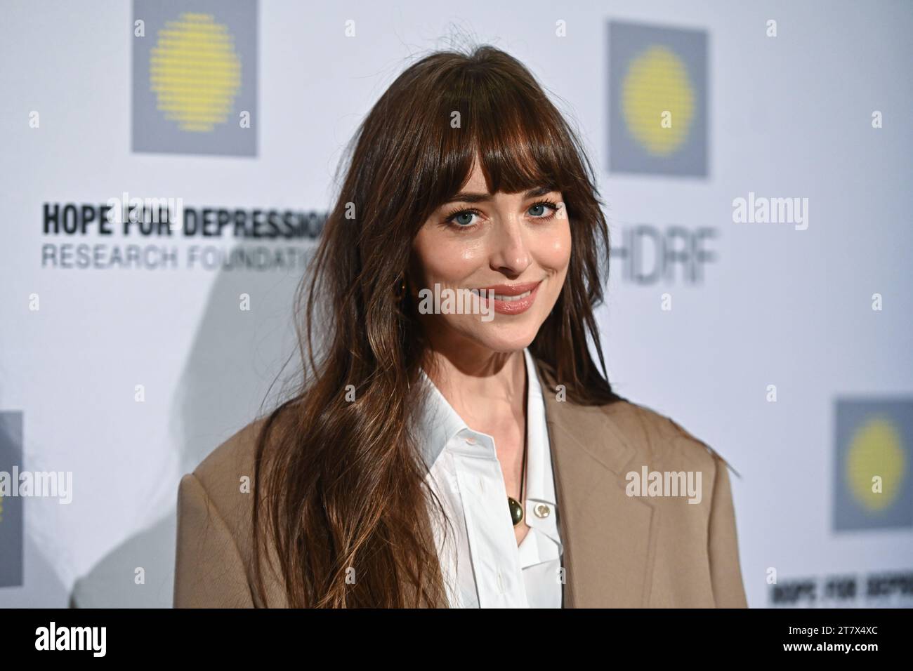 Dakota Johnson attends the 17th Annual HOPE Luncheon Seminar Honoring