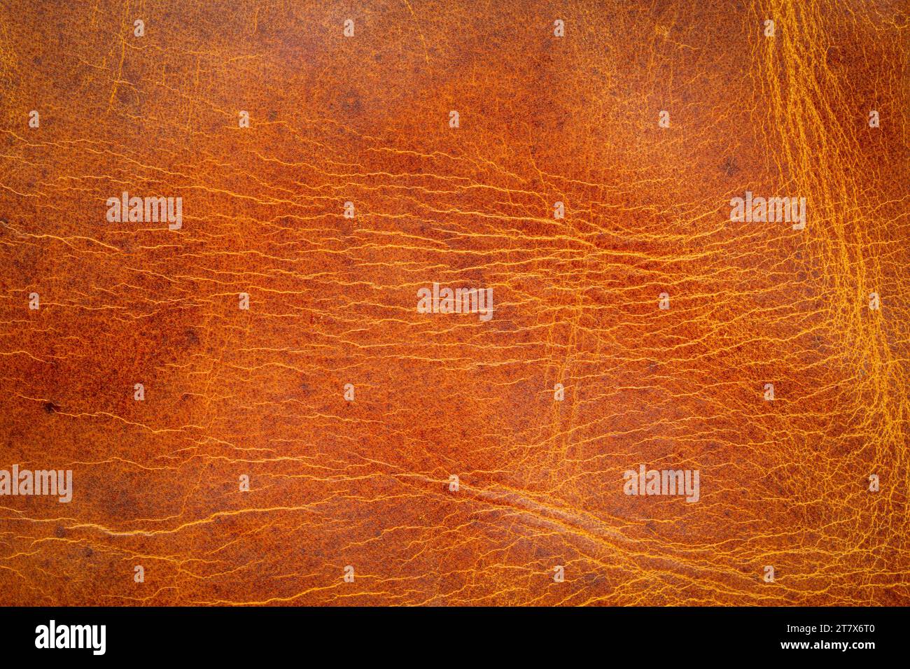 brown leather abstract from an old journal cover with scratches, marks