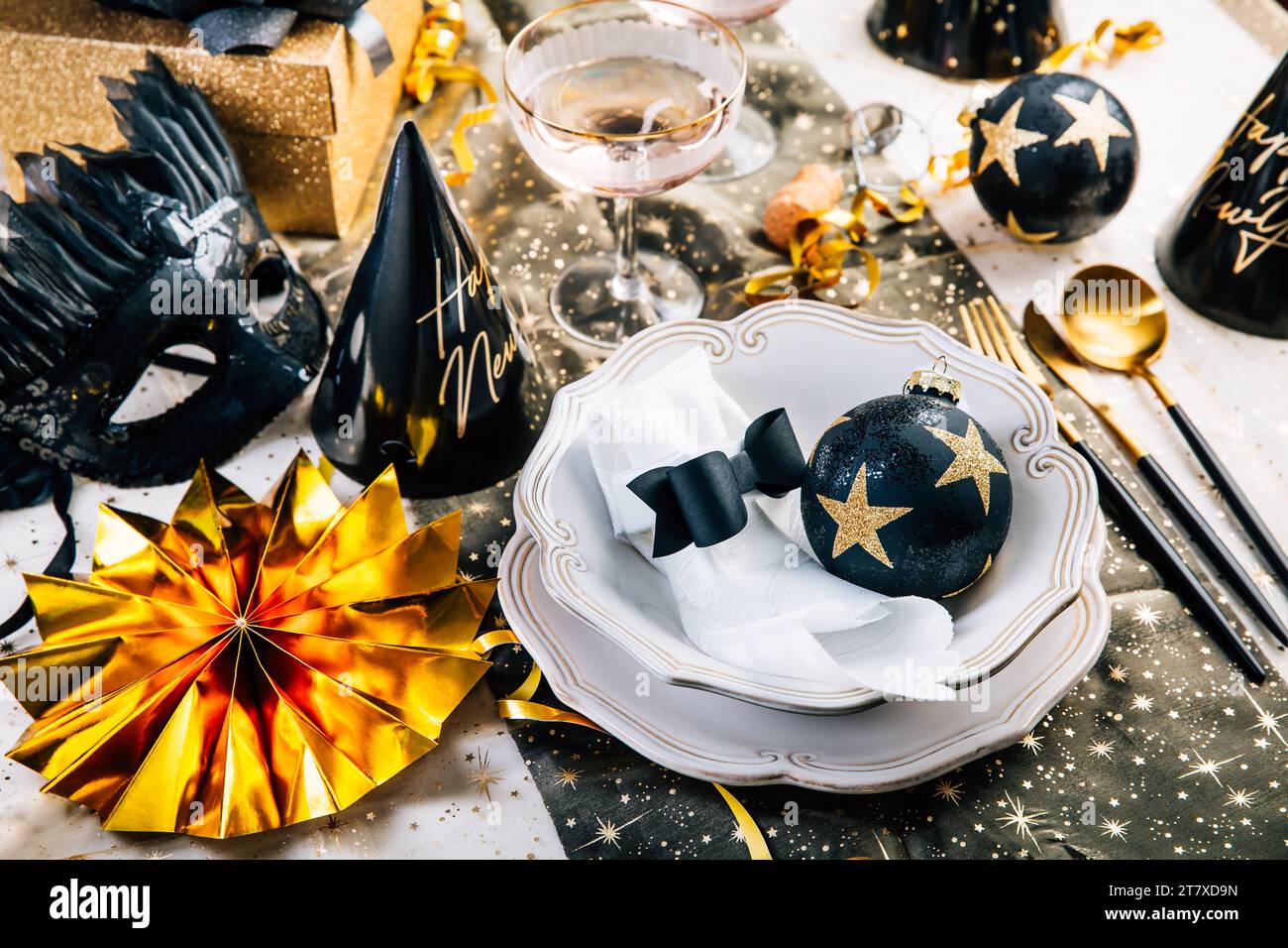 Christmas And New Year Holiday Table Setting with Champagne. Stock Photo