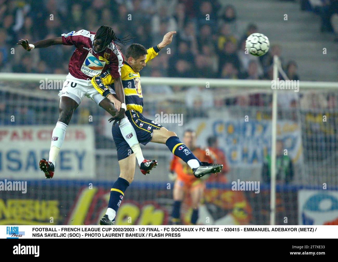 FOOTBALL - FRENCH LEAGUE CUP 2002/2003 - 1/2 FINAL - FC SOCHAUX v FC METZ - 030415 - EMMANUEL ADEBAYOR (METZ) / NISA SAVELJIC (SOC) - PHOTO LAURENT BAHEUX / FLASH PRESS Stock Photo
