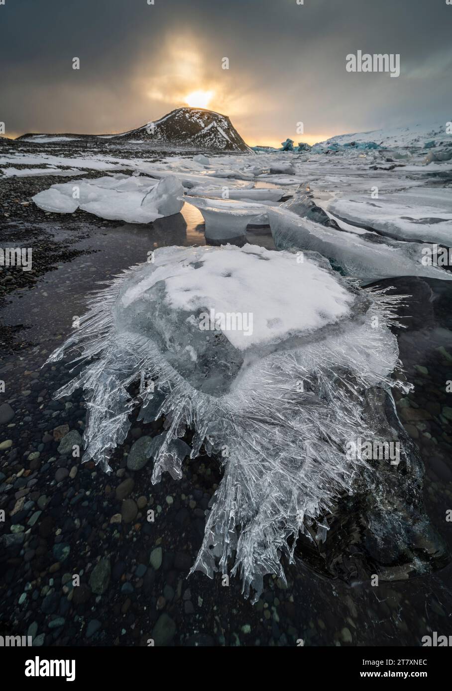 Ice shard, Jokulsarlon Ice Lagoon, sunset, Iceland, Polar Regions Stock Photo