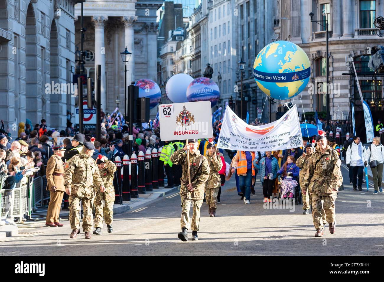 The Worshipful Company of Insurers at the Lord Mayor's Show procession 2023 in Poultry, in the City of London, UK. With Skylarks Stock Photo