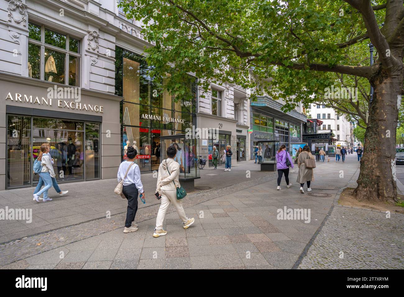 View of shops on the tree lined Kurfurstendam in Berlin, Germany, Europe Stock Photo