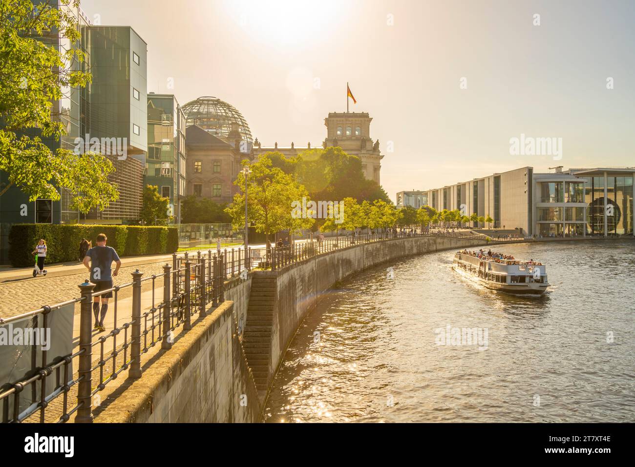 View of sightseeing cruise boat on River Spree and the Reichstag ...