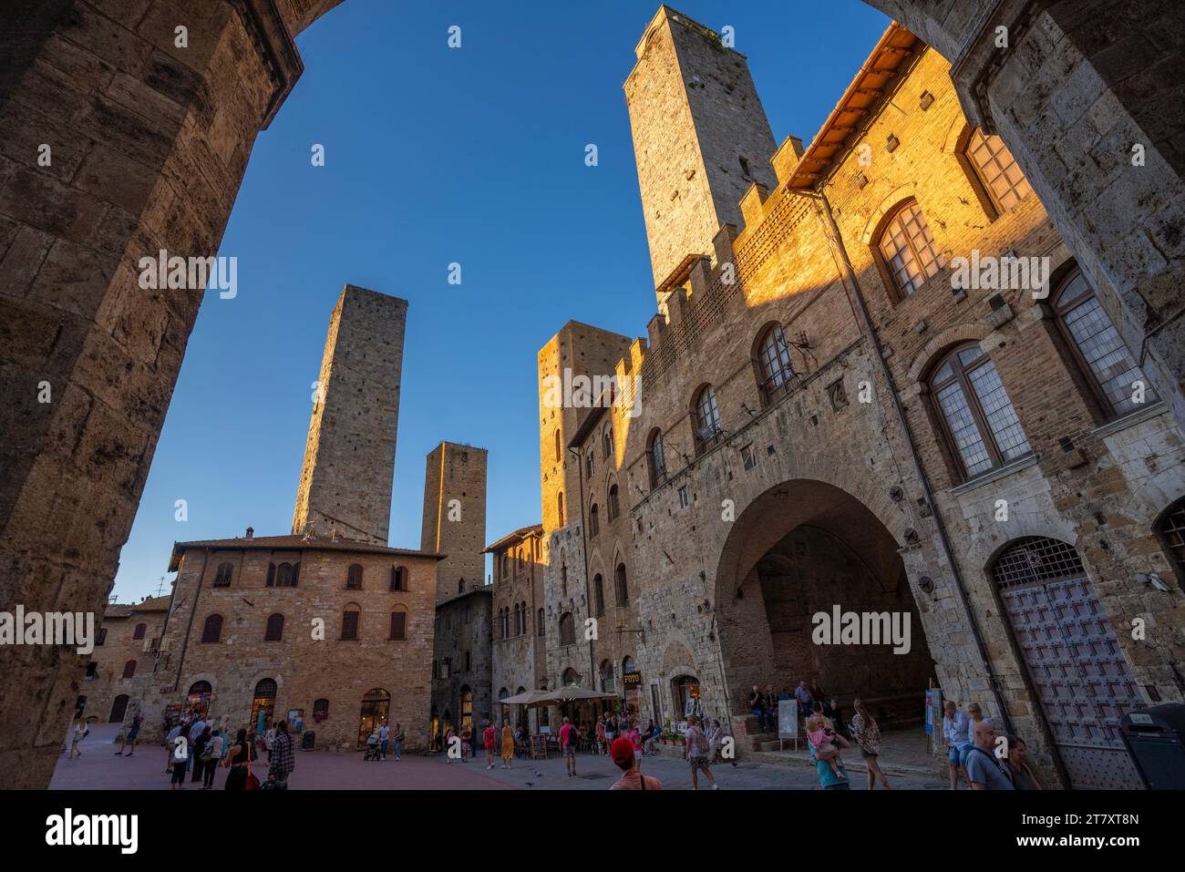 View of historic centre and towers in Piazza del Duomo, San Gimignano, UNESCO World Heritage Site, Province of Siena, Tuscany, Italy, Europe Stock Photo