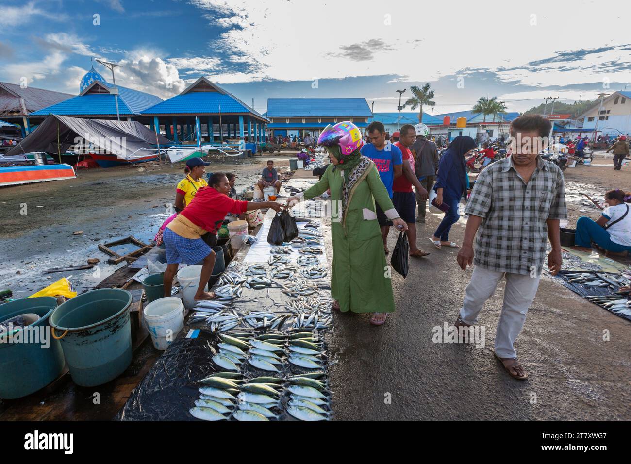 Vendors selling fresh fish at the fish market in Sorong, the largest