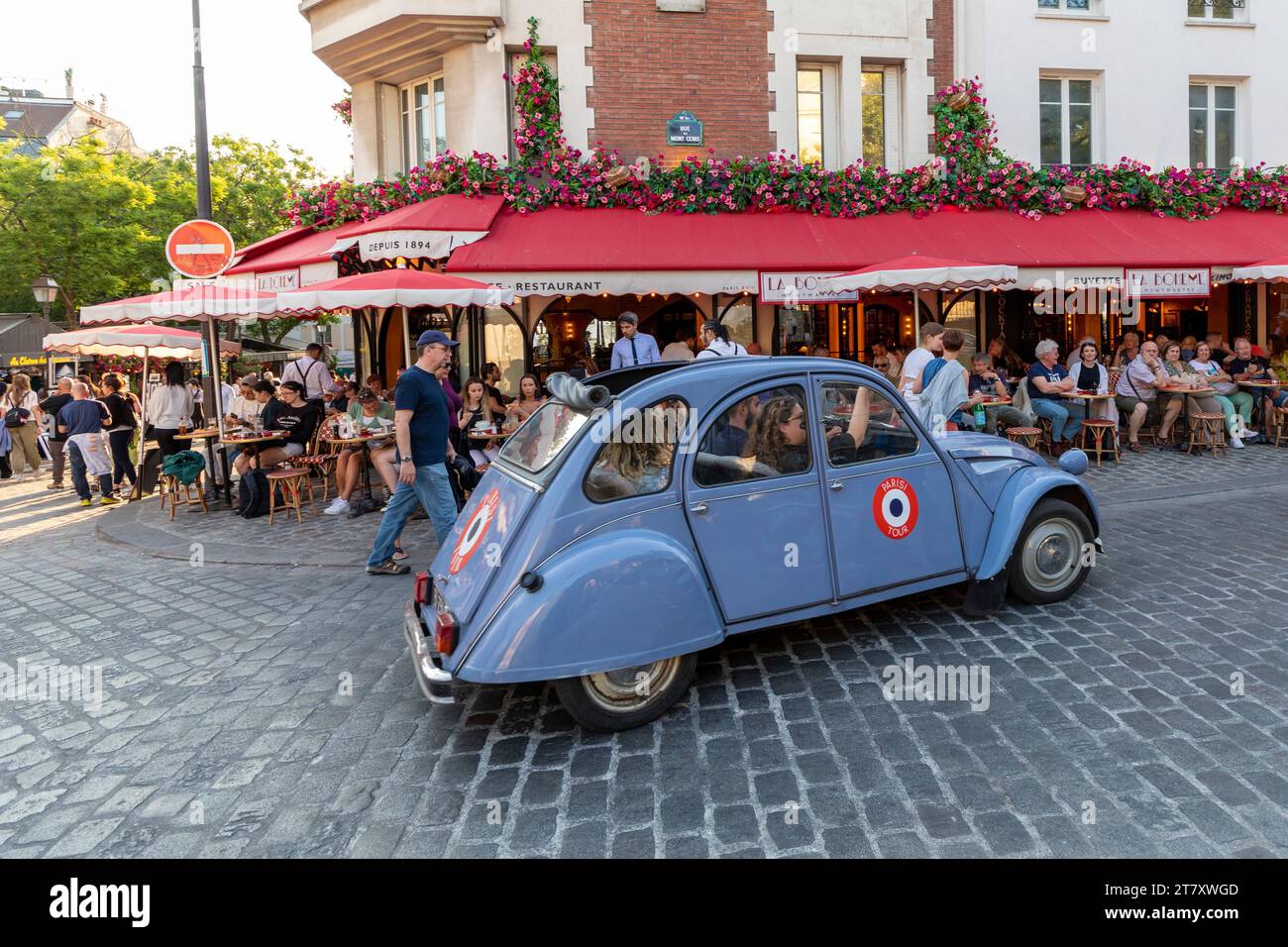 Street scene with blue Citroen 2CV car and cafe restaurant, Montmartre, Paris, France, Europe Stock Photo