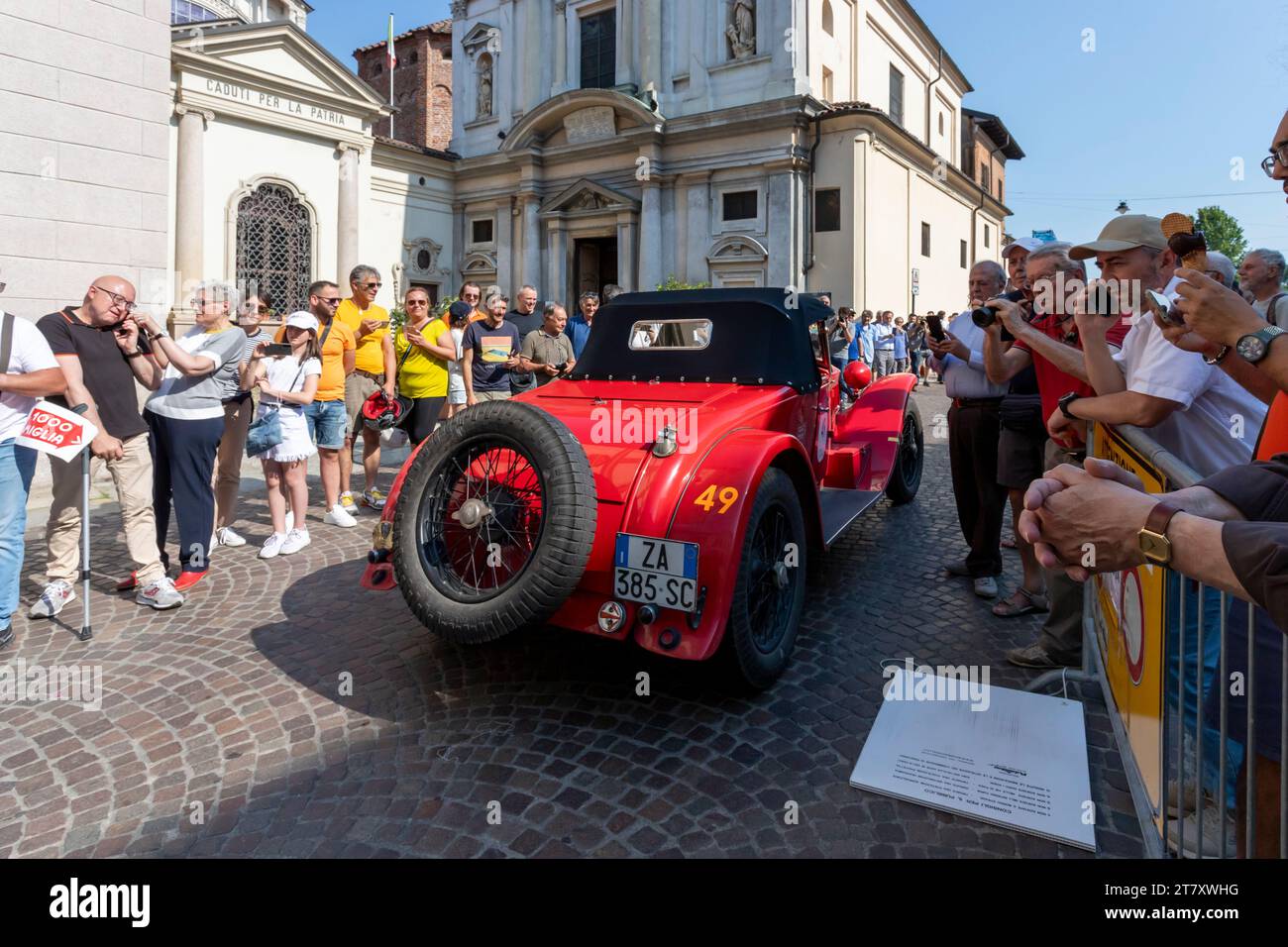 1000 Miglia, parade of historic cars between two wings of the crowd, Novara, Piedmont, Italy, Europe Stock Photo