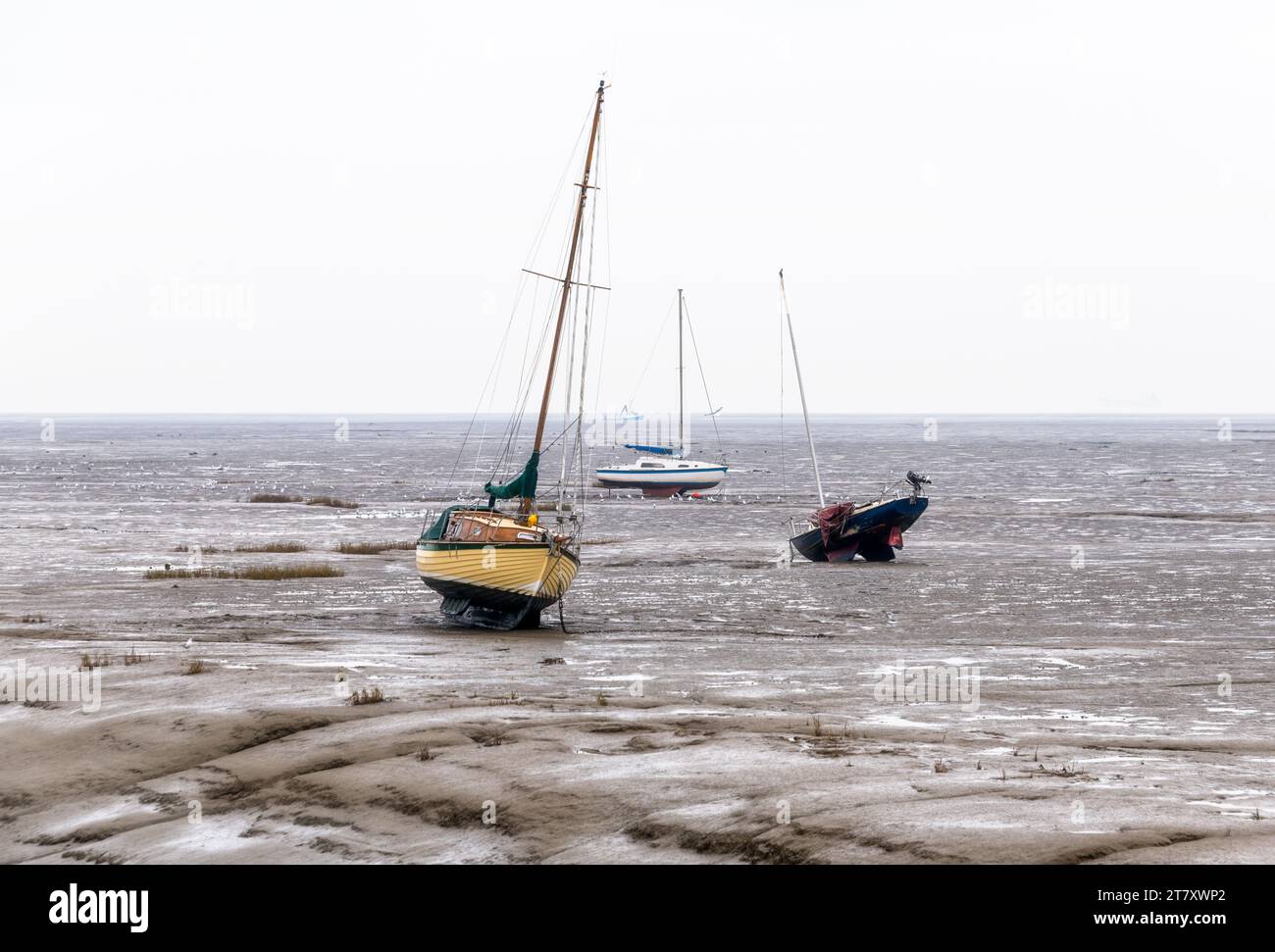 Beached boats at the low tide at Leigh on Sea, Essex, England, United Kingdom, Europe Stock Photo