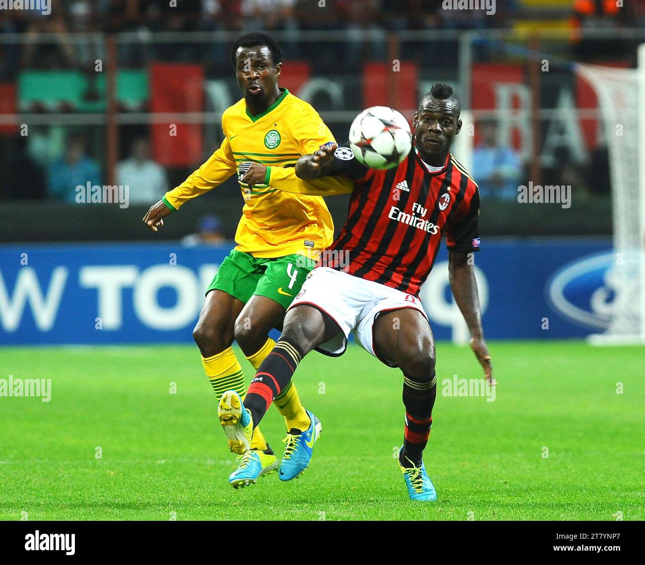 Efe Ambrose of Celtic FC competes for the ball with Mario Balotelli of AC Milan during the UEFA Champions League 2013-2014 first round match group H between AC Milano and Celtic FC on September 18, 2013, in Milan, Italy. Photo Massimo Cebrelli / DPPI Stock Photo