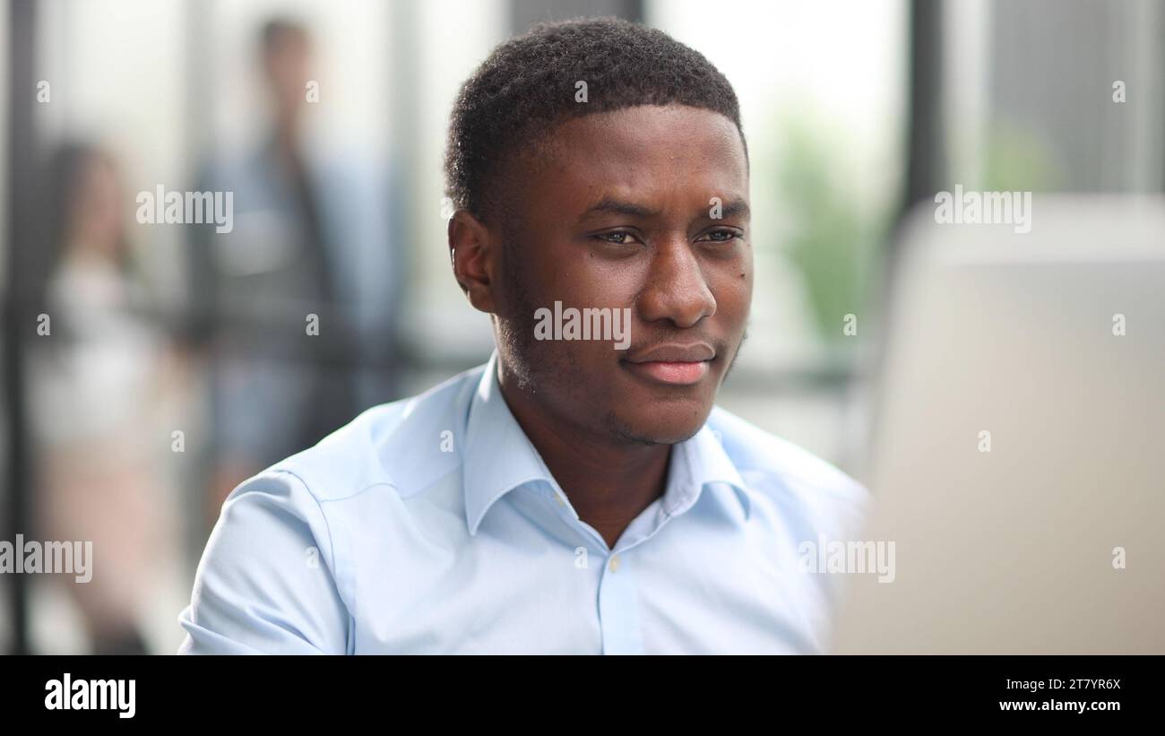 Serious concentrated african man hi-res stock photography and images ...