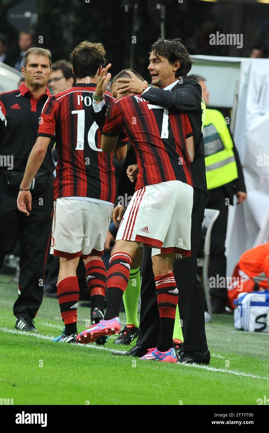 Filippo Inzaghi head coach of AC Milan hugs Jeremy Menez during the ...