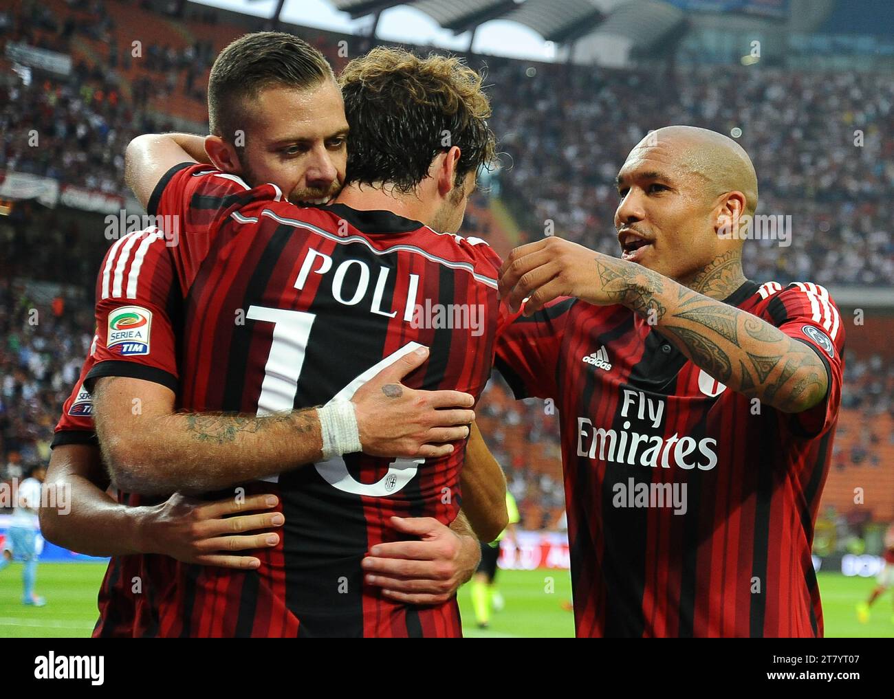 Jeremy Menez of AC Milan celebrates scoring thier team third goal with  teammates Andrea Poli and Nigel De Jong during the italian championship  2014/2015 Serie A football match between AC Milan and, image size:1300x1017