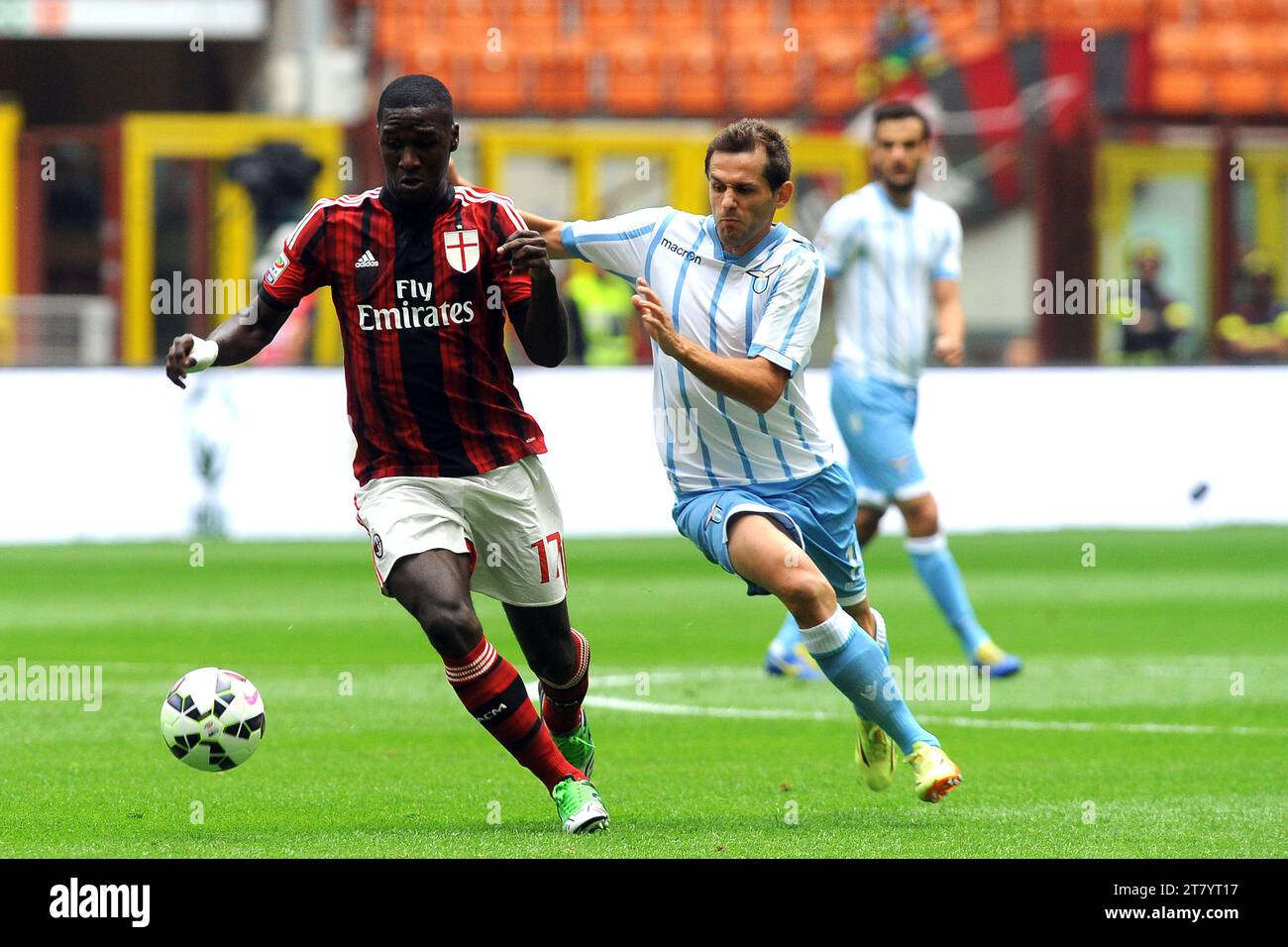 Cristian Zapata of AC Milan and Senad Lulic of SS Lazio compete for the ball during the italian championship 2014/2015 Serie A football match between AC Milan and SS Lazio at Giuseppe Meazza Stadium on August 31, 2014 in Milan, Italy. Photo Massimo Cebrelli/DPPI Stock Photo
