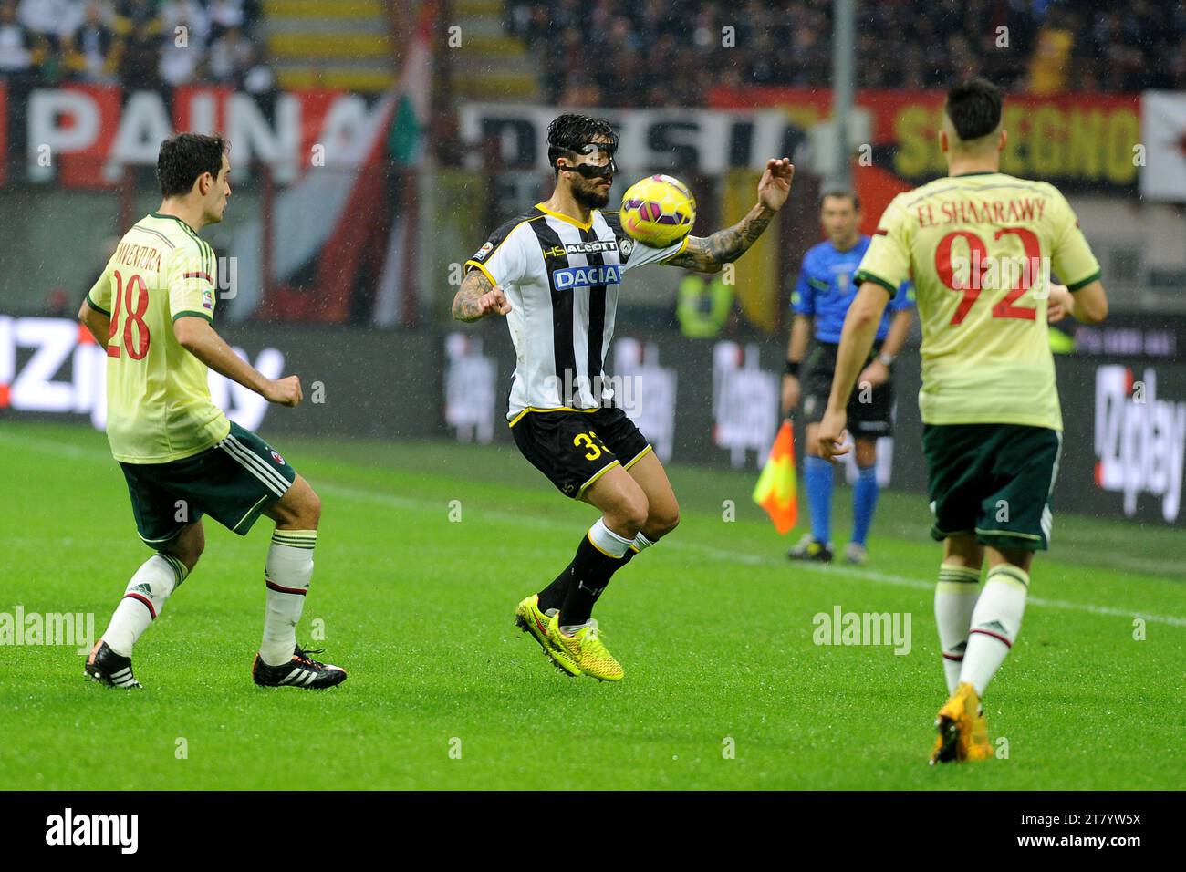 Masked Panagiotis Kone of Udinese Calcio controls the ball during the Italian championship Serie A football match between AC Milan and Udinese on November 30, 2014 at San Siro Stadium in Milan, Italy. Photo Massimo Cebrelli / DPPI Stock Photo