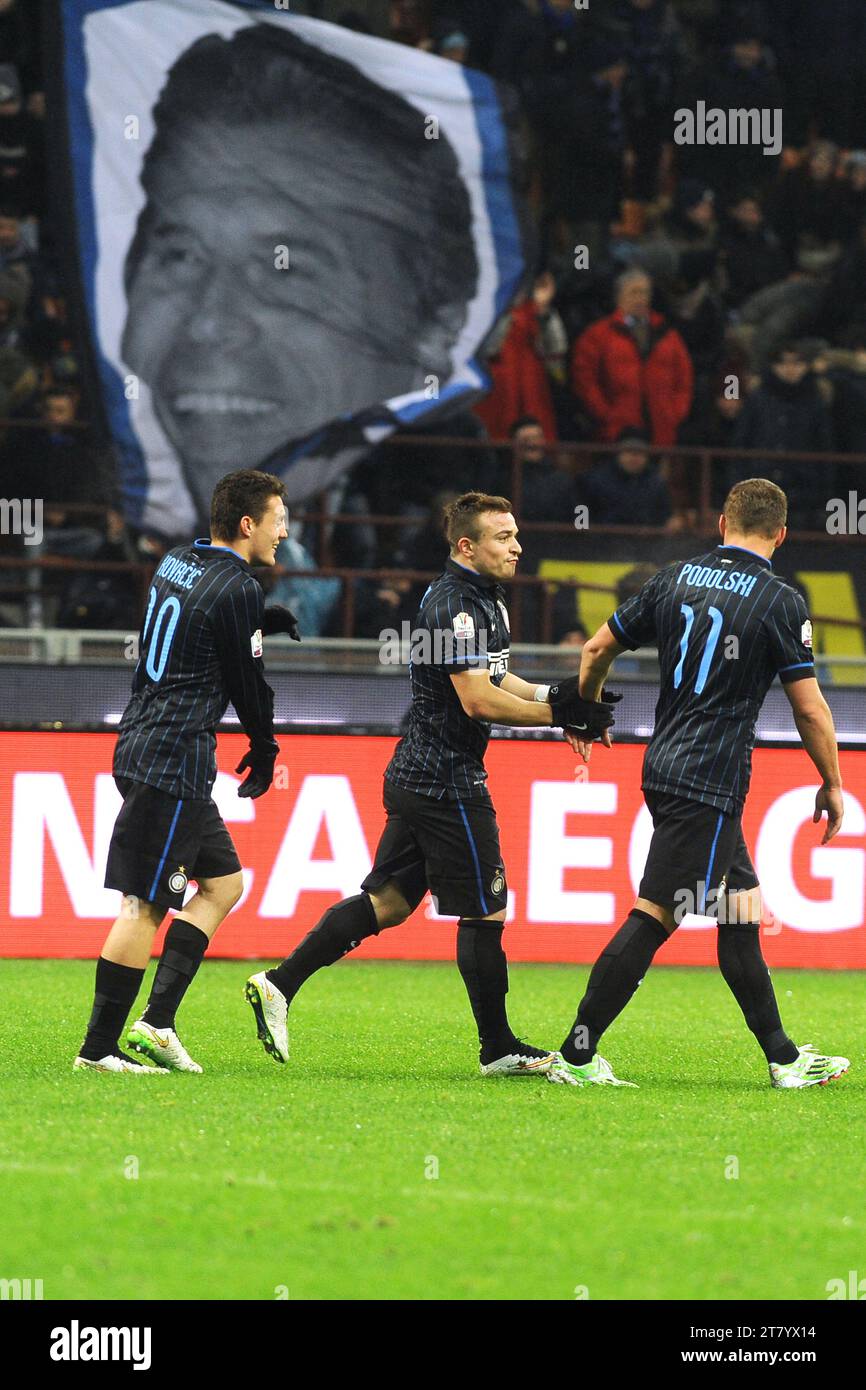 Players of FC Inter Milan celebrate their team opening goal as behind them a flag with legend of FC Inter Milan Giacinto Facchetti is waved by fans during the Italian Cup football match round of 16 between FC Internazionale and UC Sampdoria on January 21, 2015 in Milan, Italy. Photo Massimo Cebrelli / DPPI Stock Photo