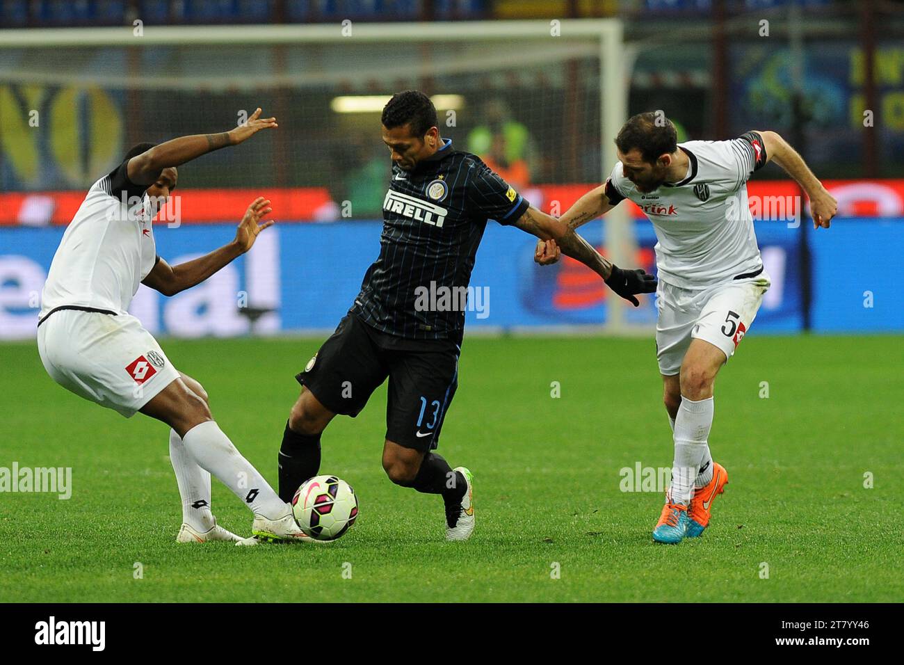 Fredy Guarin of FC Inter Milan challenges for the ball among Carlos Carbonero and Luigi Giorgi of AC Cesena during the italian championship Serie A football match between FC Internazionale and AC Cesena on March 15, 2015 at Giuseppe Meazza Stadium in Milan, Italy. Photo Massimo Cebrelli / DPPI Stock Photo