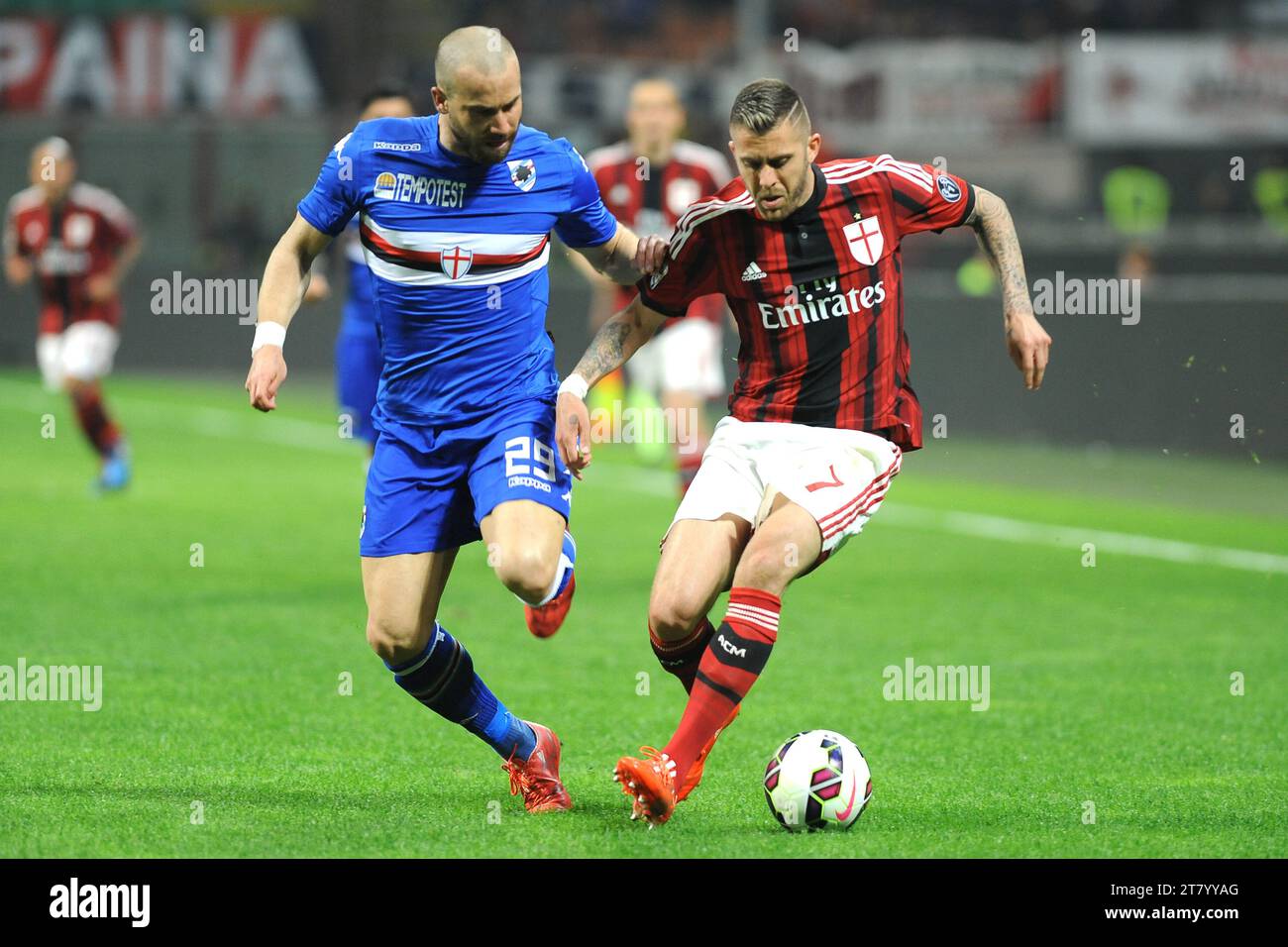 Jeremy Menez (right) of AC Milan and Lorenzo De Silvestri of UC Sampdoria challenge for the ball during the italian championship 2014/2015 Serie A football match between AC Milan and UC Sampdoria at Giuseppe Meazza Stadium on April 12, 2015 in Milan, Italy. Photo Massimo Cebrelli/DPPI Stock Photo