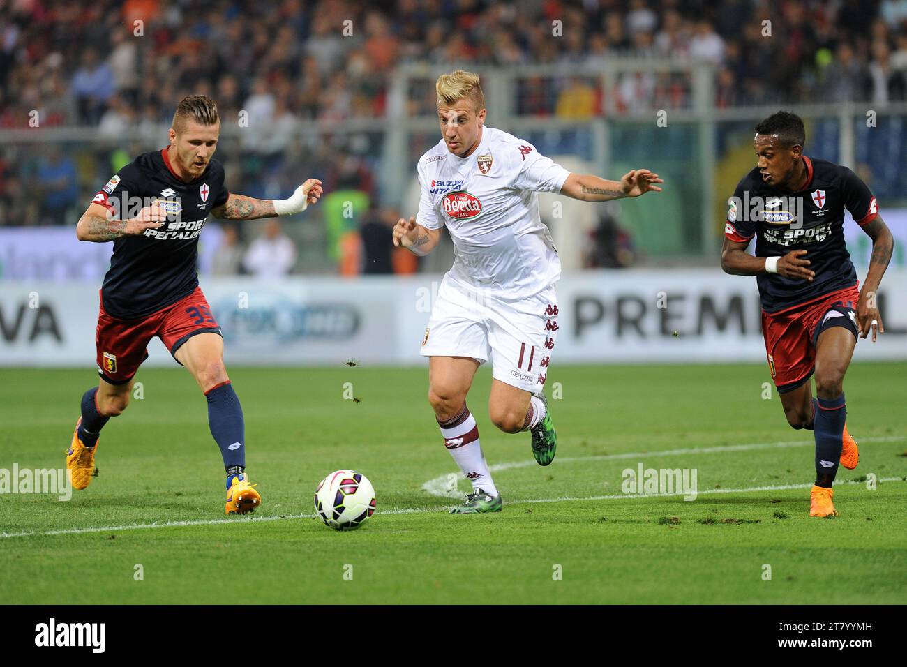 Maxi Lopez of Torino FC controls thw ball among Juraj Kucka and Edenilson during the italian championship 2014/2015 Serie A football match between Genoa CFC and Torino FC at Luigi Ferraris Stadium on May 11, 2015 in Genoa, Italy. Photo Massimo Cebrelli/DPPI Stock Photo