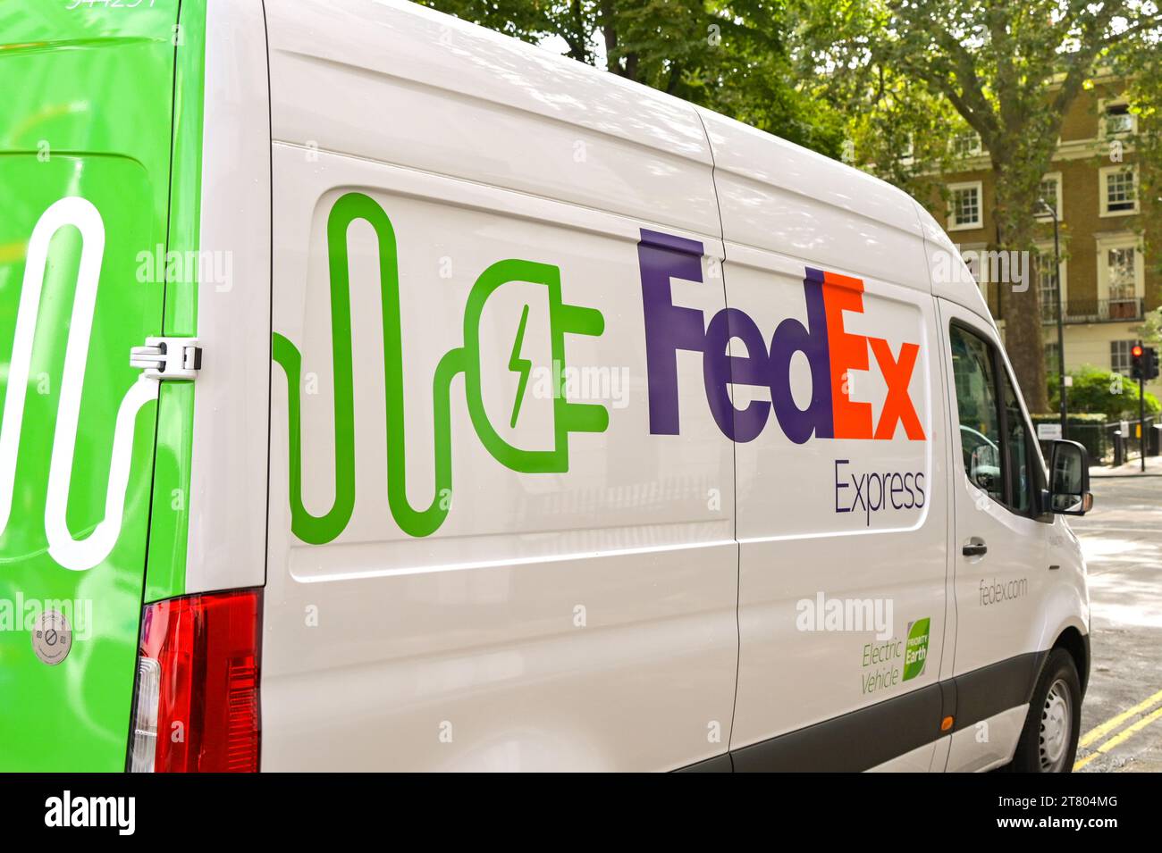 London, England, UK - 22 August 2023: Side view of an electirc delivery van used by the FedEx Express courier company. Stock Photo
