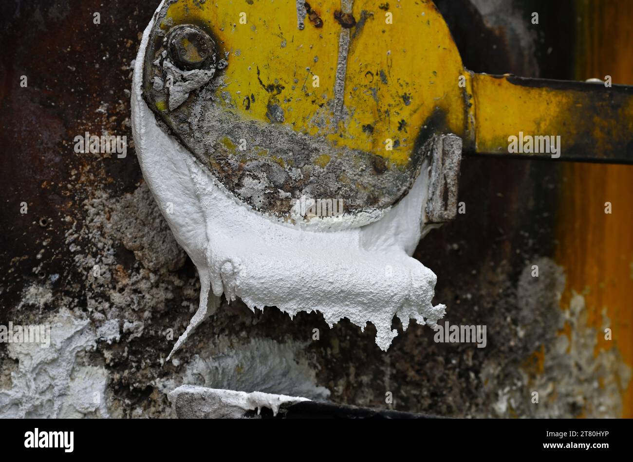 White paint oozing with mixed colours abstract Stock Photo