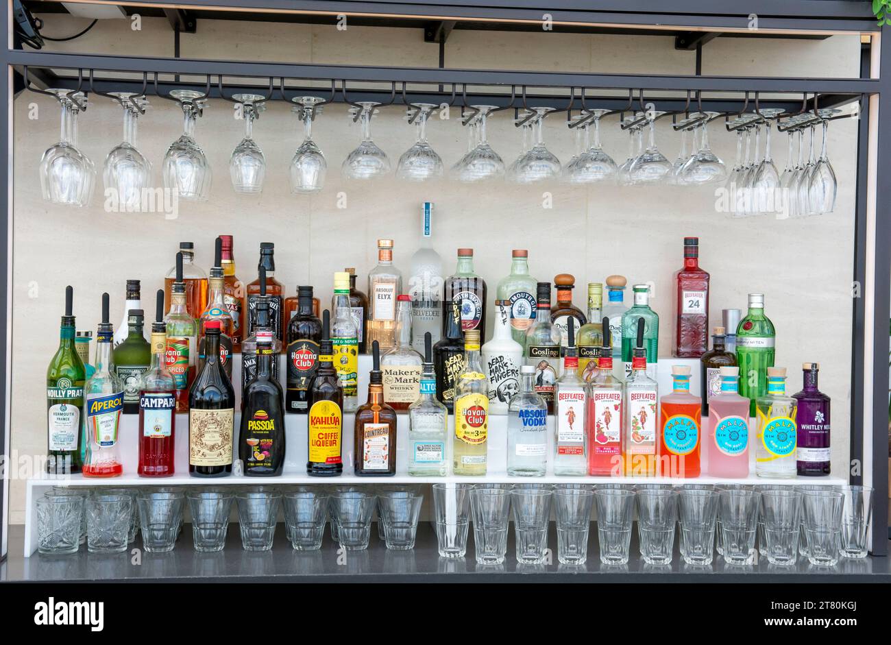 London, UK - May, 10, 2023 : Bottles of alcohol and spirits at a restaurant bar. Variety of labels and brands for making cocktails and drinks. Stock Photo
