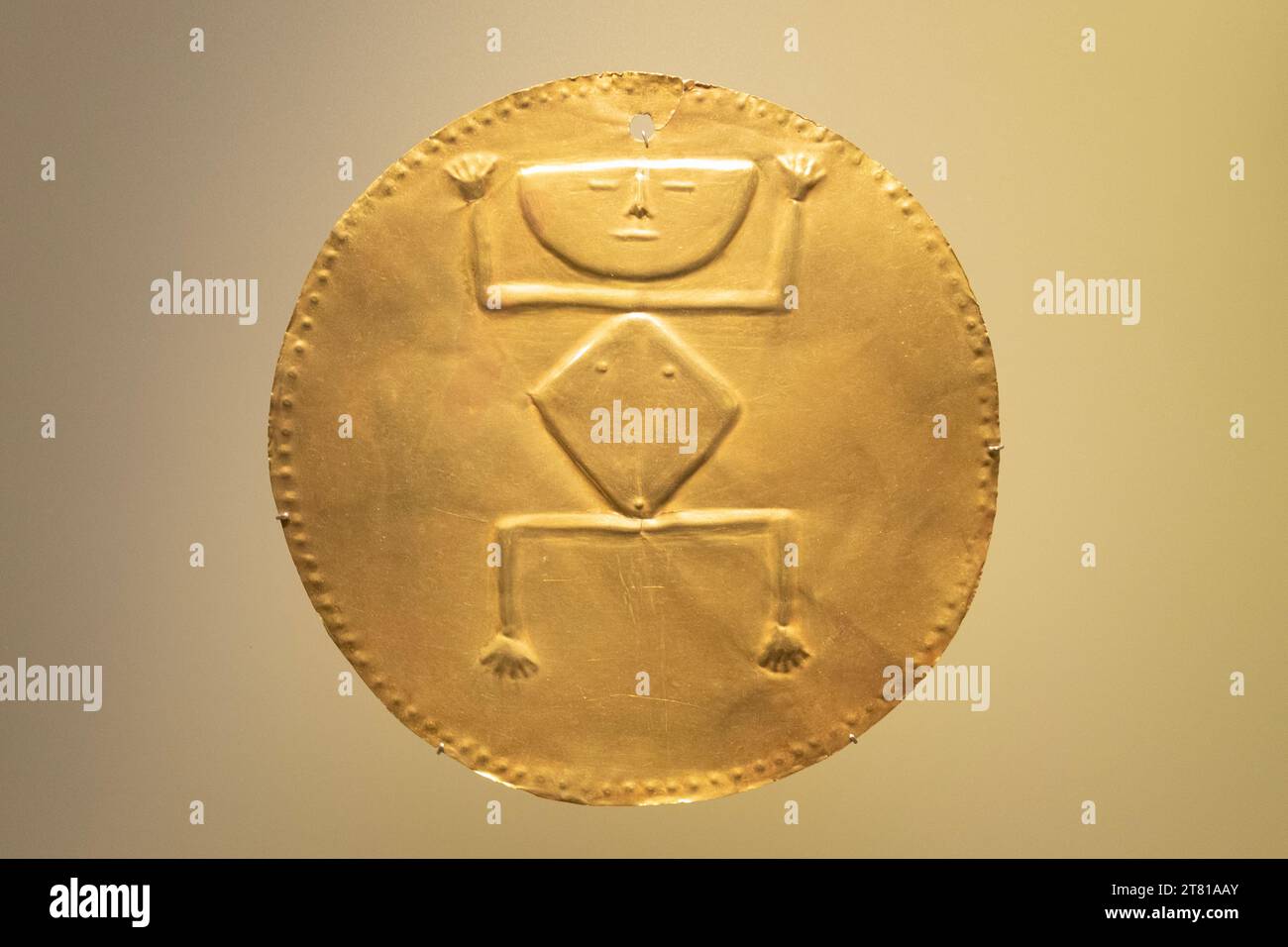 Beautiful ancient rounded golden pectoral of a chaman at golden museum Stock Photo