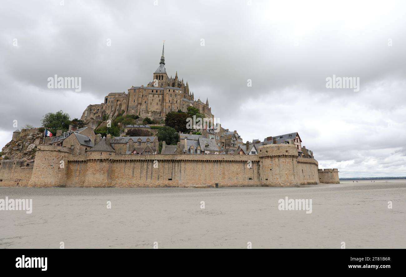 famous-ancient-mont-saint-michel-abbey-above-the-hill-at-low-tide-and
