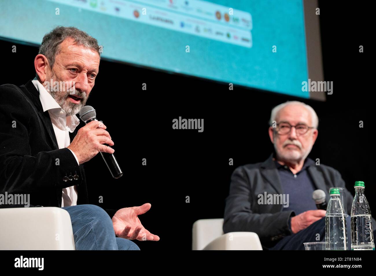 Cuneo, Italy. November 17, 2023. The journalist and writer Michele Serra together with the satirical designer and cartoonist Altan at the presentation of their recently published book at the Scrittorincittà National Literary Festival. Credit: Luca Prestia / Alamy Live News Stock Photo