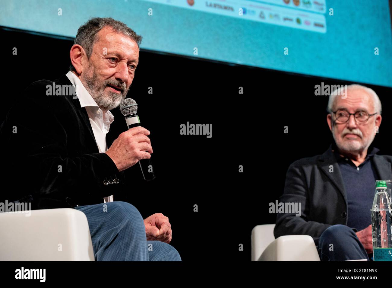 Cuneo, Italy. November 17, 2023. The journalist and writer Michele Serra together with the satirical designer and cartoonist Altan at the presentation of their recently published book at the Scrittorincittà National Literary Festival. Credit: Luca Prestia / Alamy Live News Stock Photo