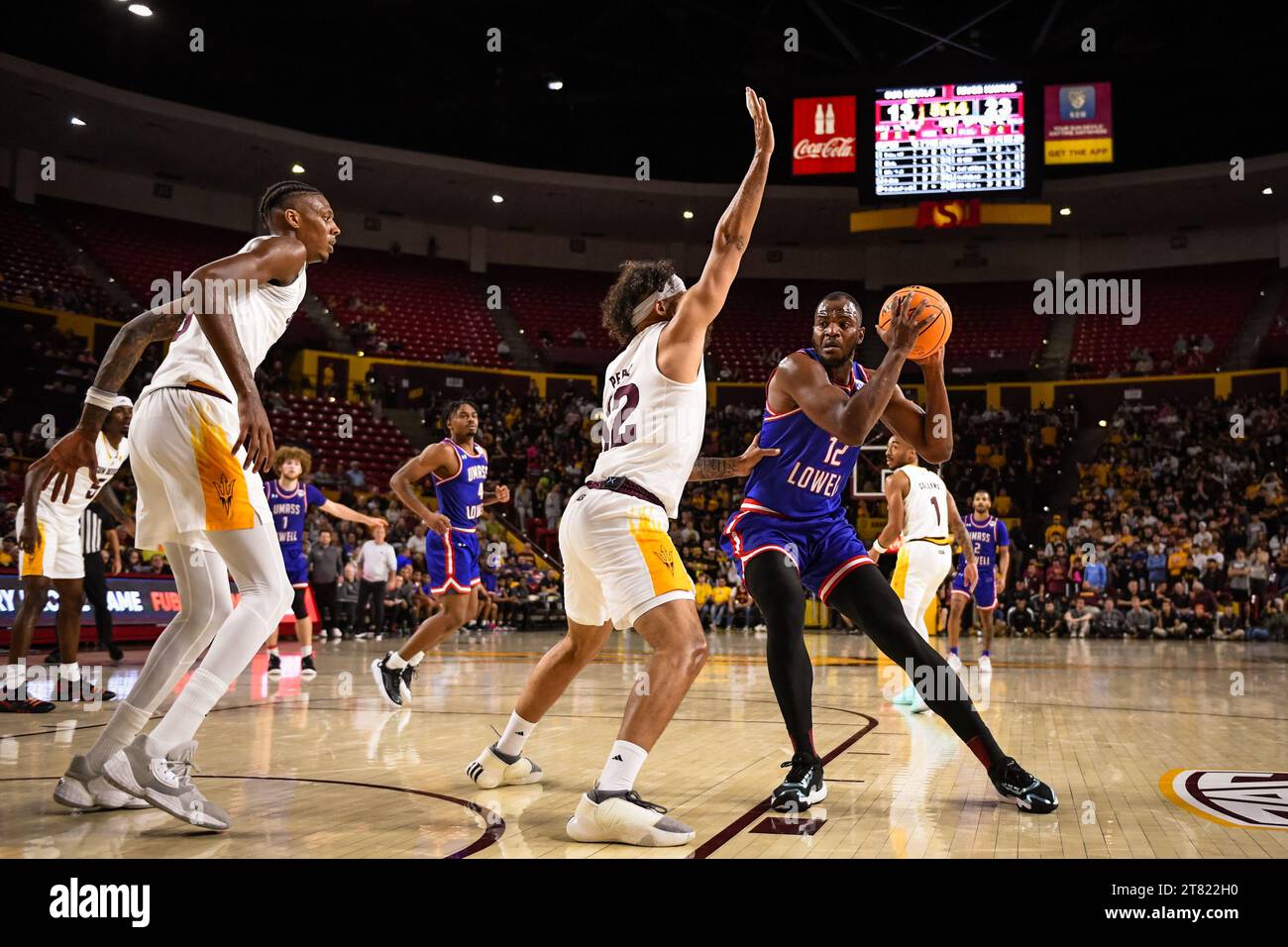 UMass Lowell River Hawks forward Abdoul Karim Coulibaly (12) drives toward the basket in the first half of the NCAA basketball game against Arizona St Stock Photo