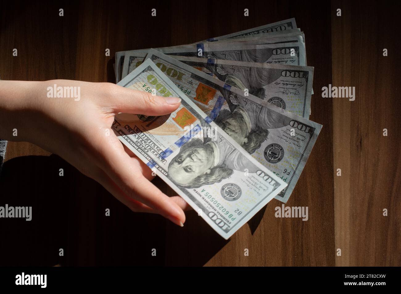 Dollar bills background. American money cash. One hundred usd dollars banknotes. Financial and economic crisis Stock Photo