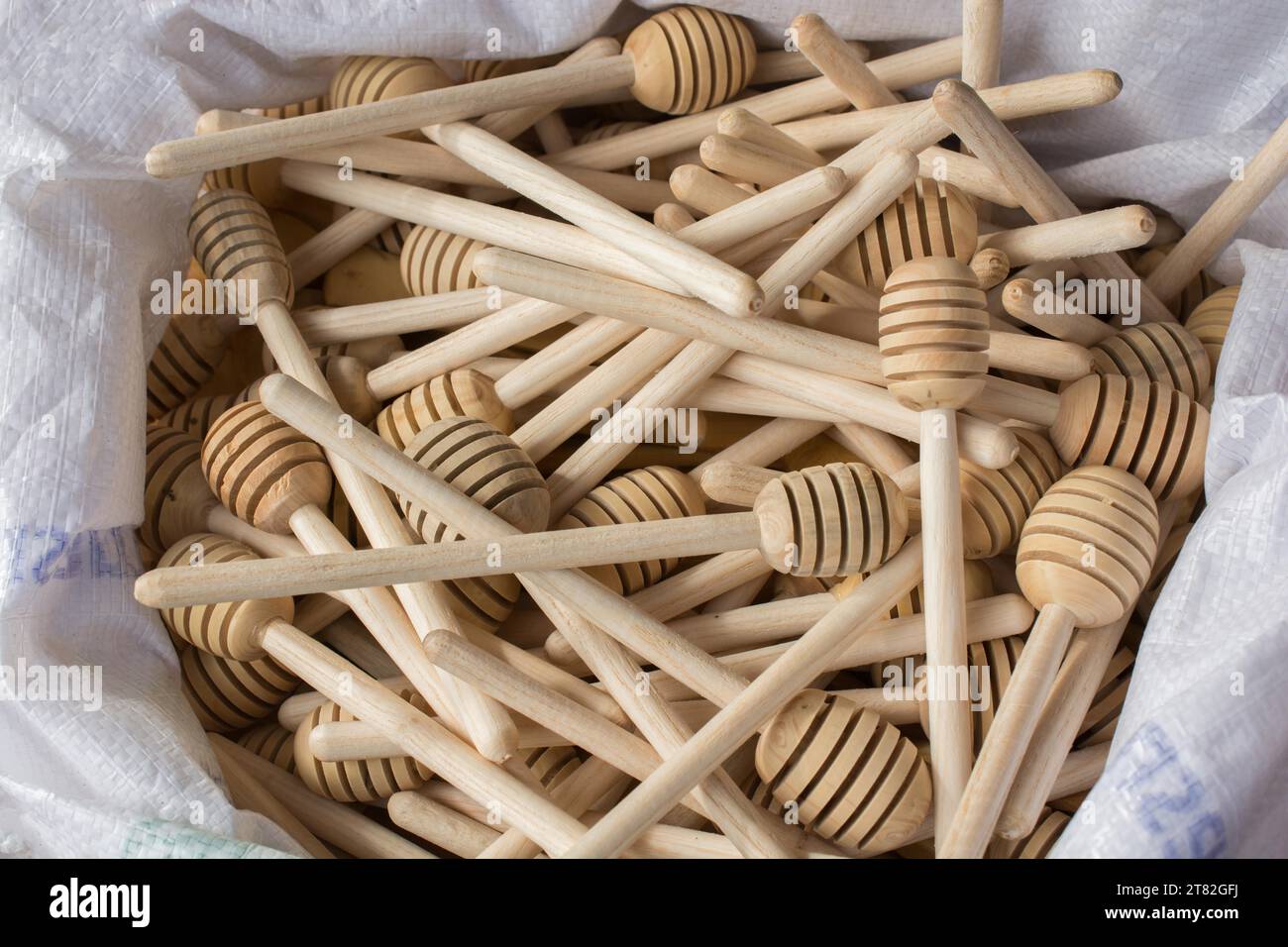 Set of honey dippers made of wood Stock Photo Alamy