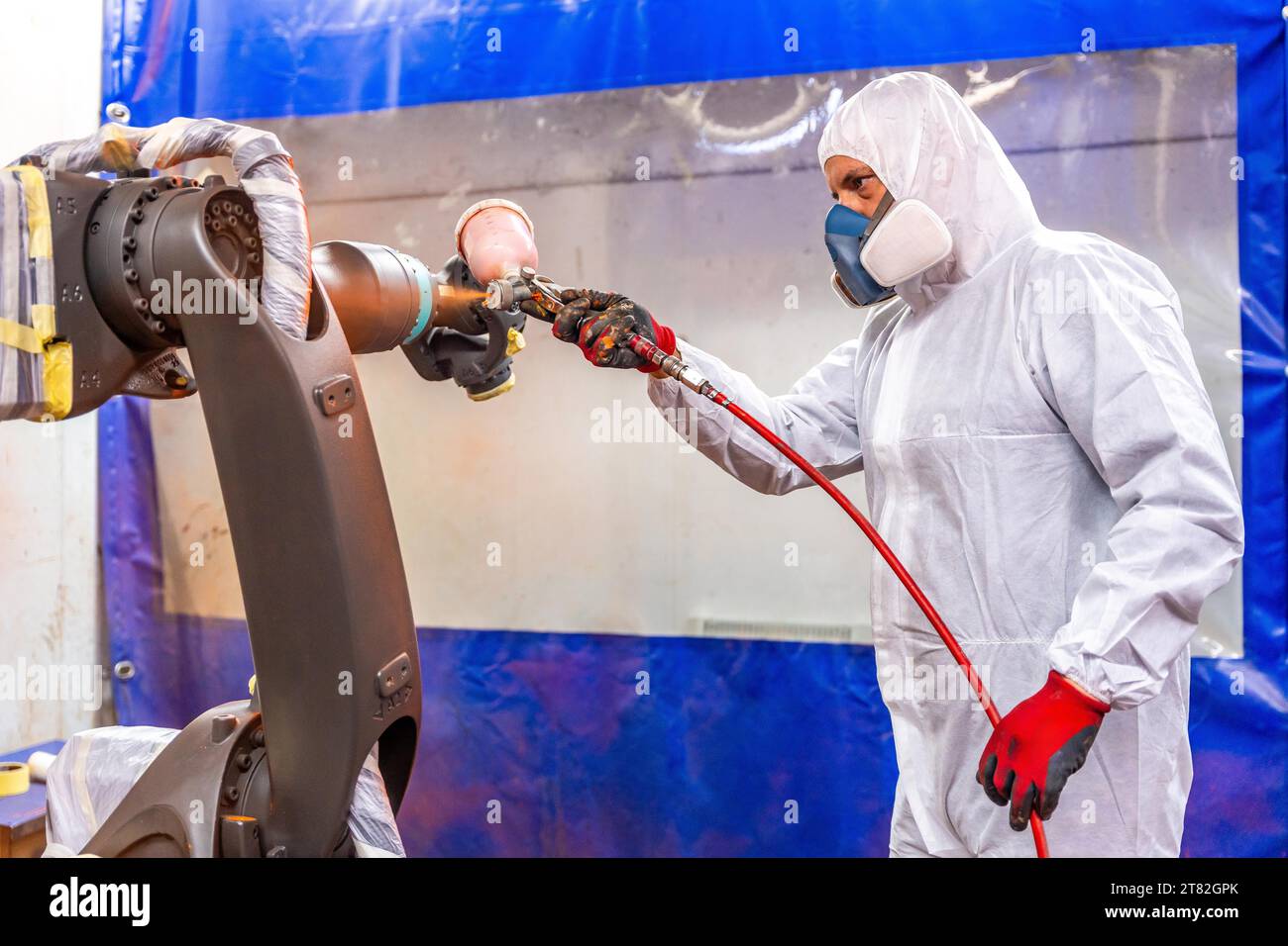 Robot arm paint spray hires stock photography and images Alamy
