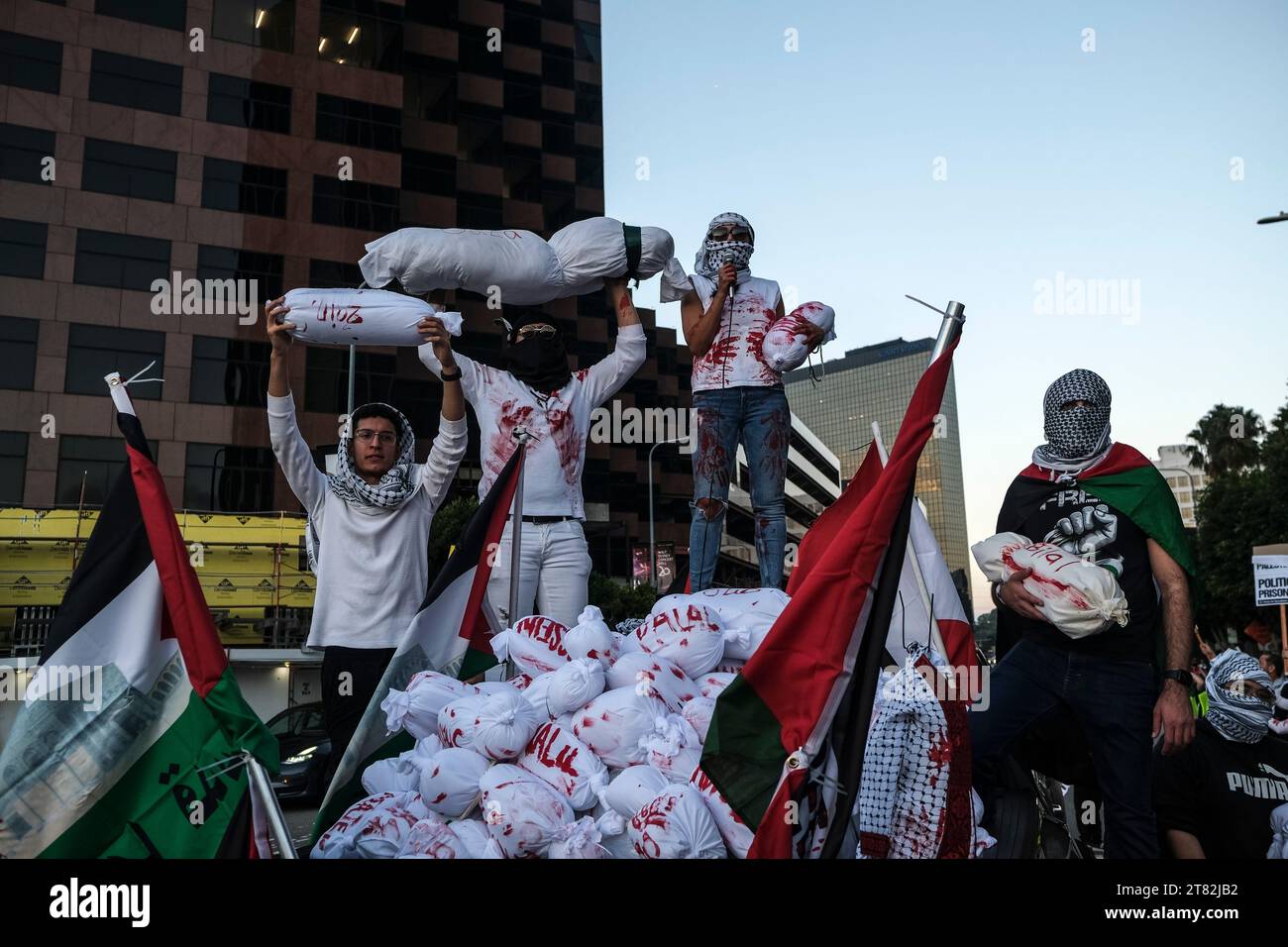 Los Angeles, United States. 17th Nov, 2023. Pro Palestinian protesters hold fake dead bodies bags of children during the demonstration. Demonstrators, led by Palestinian Youth Movement gathered outside the Consulate General of Israel in Los Angeles to protest against Israel's ongoing siege of the Gaza Strip and the humanitarian crisis that it is causing. (Photo by Adam Delgiudice/SOPA Images/Sipa USA) Credit: Sipa USA/Alamy Live News Stock Photo
