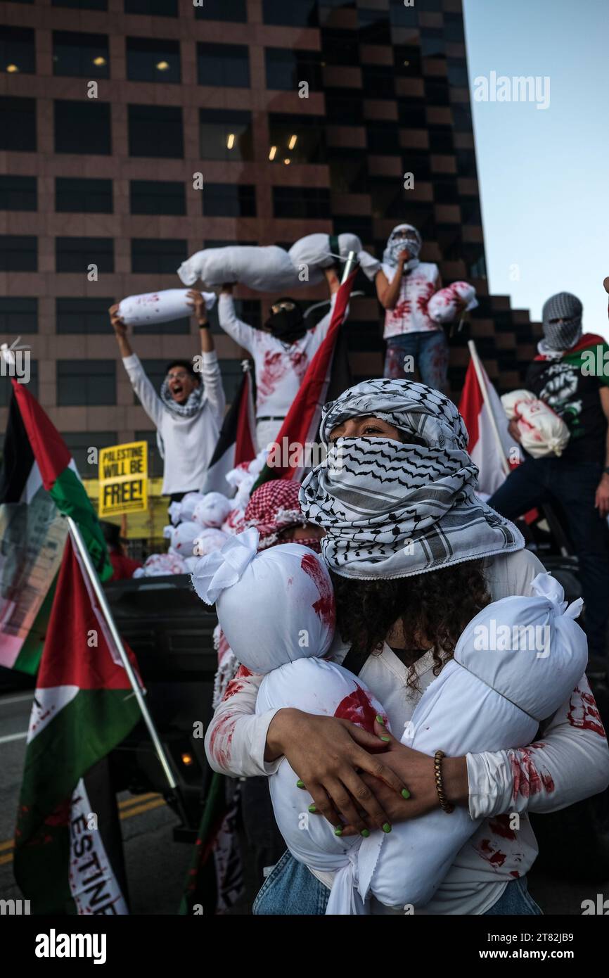 Los Angeles, United States. 17th Nov, 2023. Pro Palestinian protesters hold fake dead bodies bags of children during the demonstration. Demonstrators, led by Palestinian Youth Movement gathered outside the Consulate General of Israel in Los Angeles to protest against Israel's ongoing siege of the Gaza Strip and the humanitarian crisis that it is causing. Credit: SOPA Images Limited/Alamy Live News Stock Photo