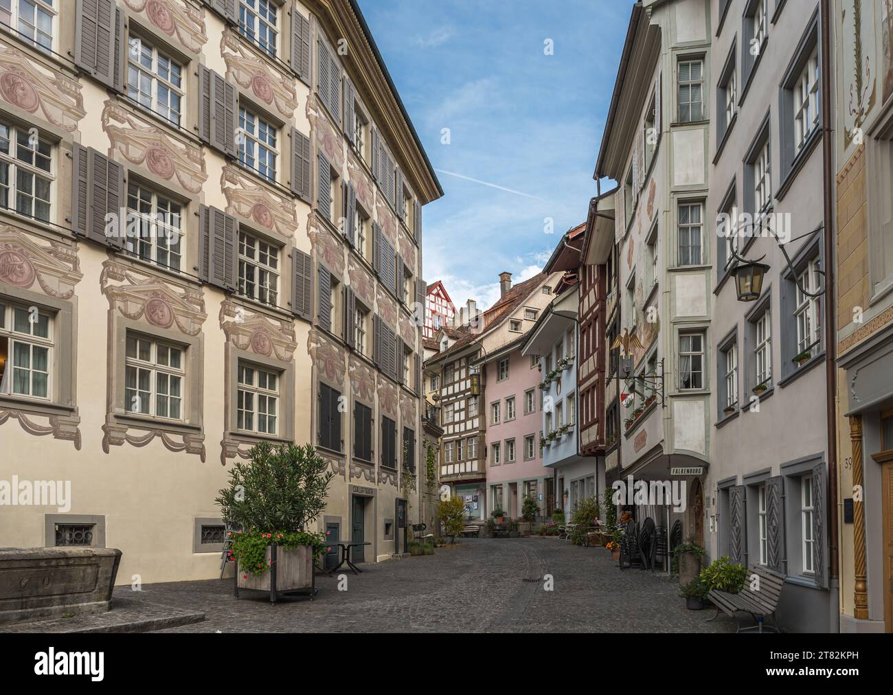 Alley with historic houses with facade paintings in the  old town of Wil, Canton St. Gallen, Switzerland Stock Photo