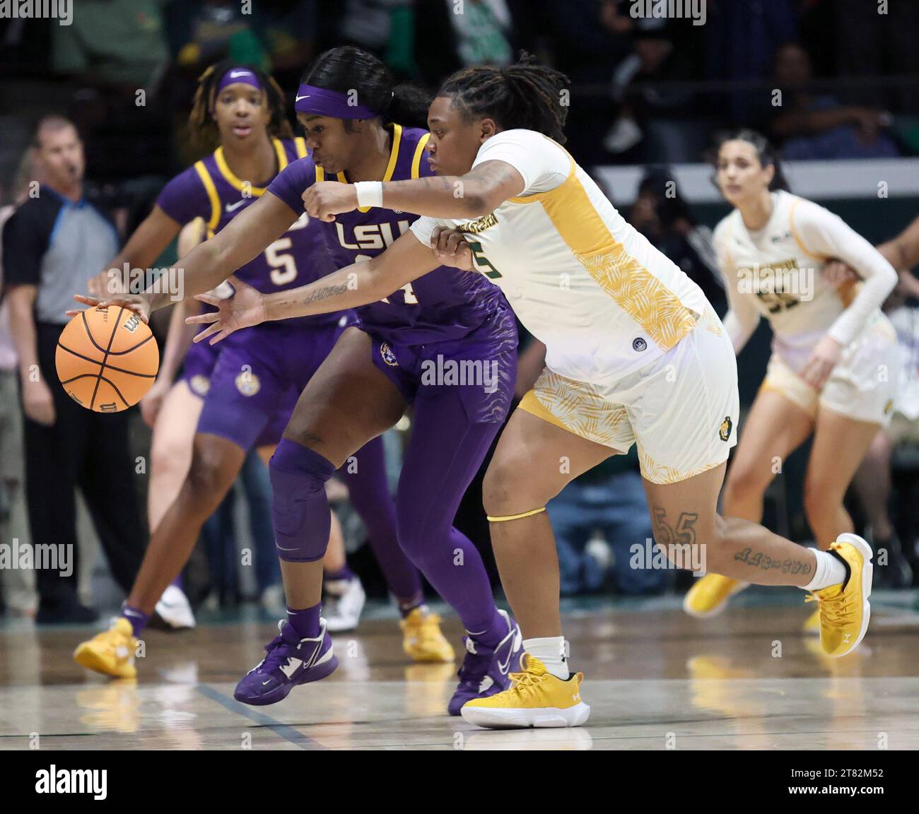 Hammond, USA. 17th Nov, 2023. LSU Lady Tigers guard Aneesah Morrow (24) and SE Louisiana Lady Lions guard Taylor Bell (5) both go after a loose ball during a women's college basketball game at the University Center in Hammond, Louisiana on Friday, November 17, 2023. (Photo by Peter G. Forest/Sipa USA) Credit: Sipa USA/Alamy Live News Stock Photo