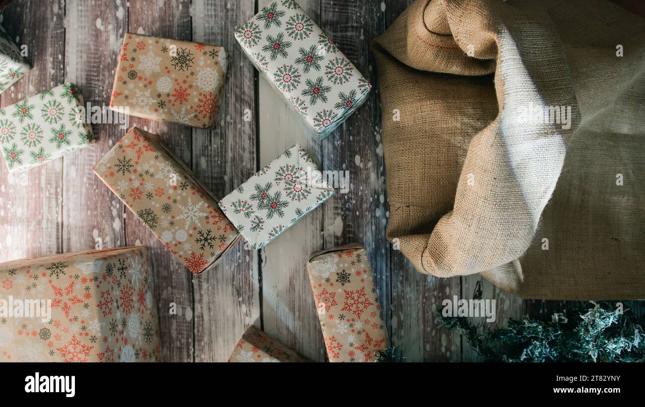 Santa Claus Sack with gift Boxes Stock Photo - Alamy