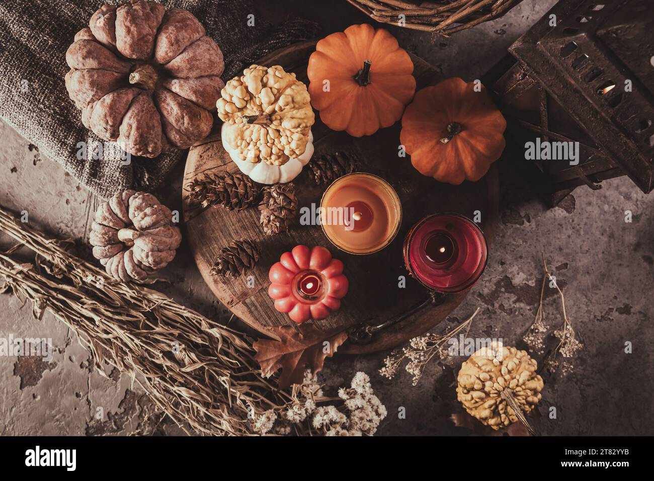 Home decoration with pumpkins and candles for Thanksgiving and Halloween Stock Photo
