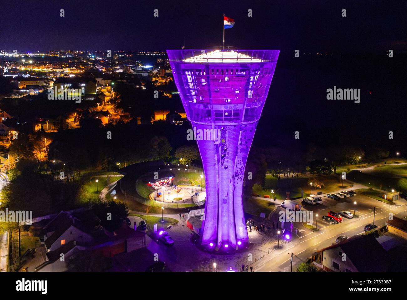 (231118) -- VUKOVAR, Nov. 18, 2023 (Xinhua) -- This aerial photo taken on Nov. 17, 2023 shows the Vukovar Water Tower illuminated in purple to mark the World Prematurity Day in Vukovar, Croatia. World Prematurity Day is observed on Nov. 17. (Davor Javorovic/PIXSELL via Xinhua) Stock Photo