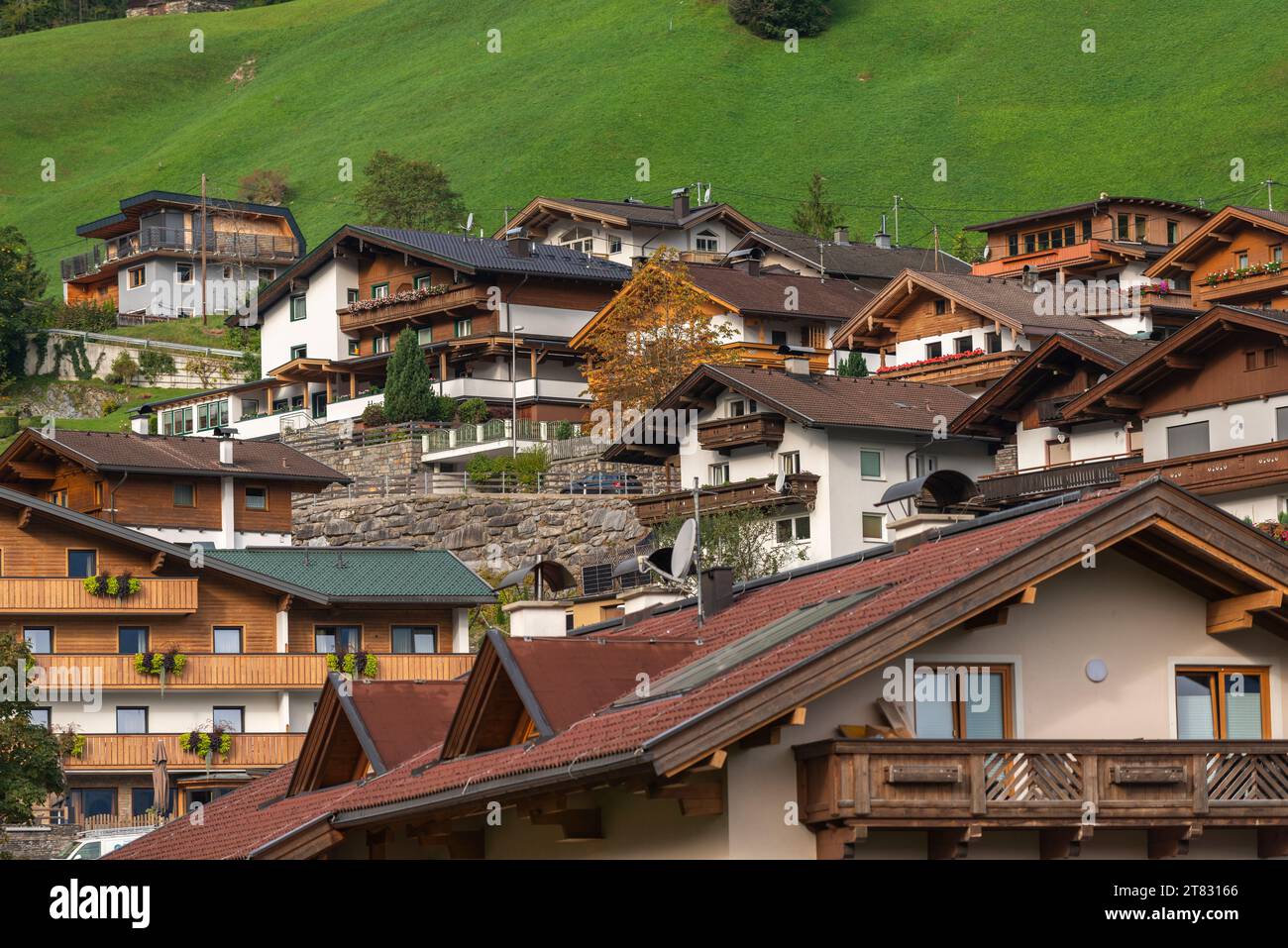 Typical Tyrolean houses with wooden gable and balcony in Finkenberg community, Valley Tuxertal, The Apls, Zillertaler Alpen, Tiyol, Austria, Europe Stock Photo