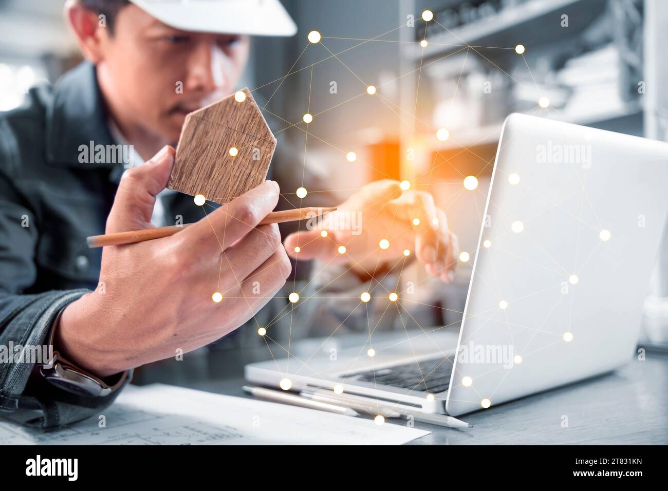 Engineer or Architect uses a laptop or technology for construction development Stock Photo