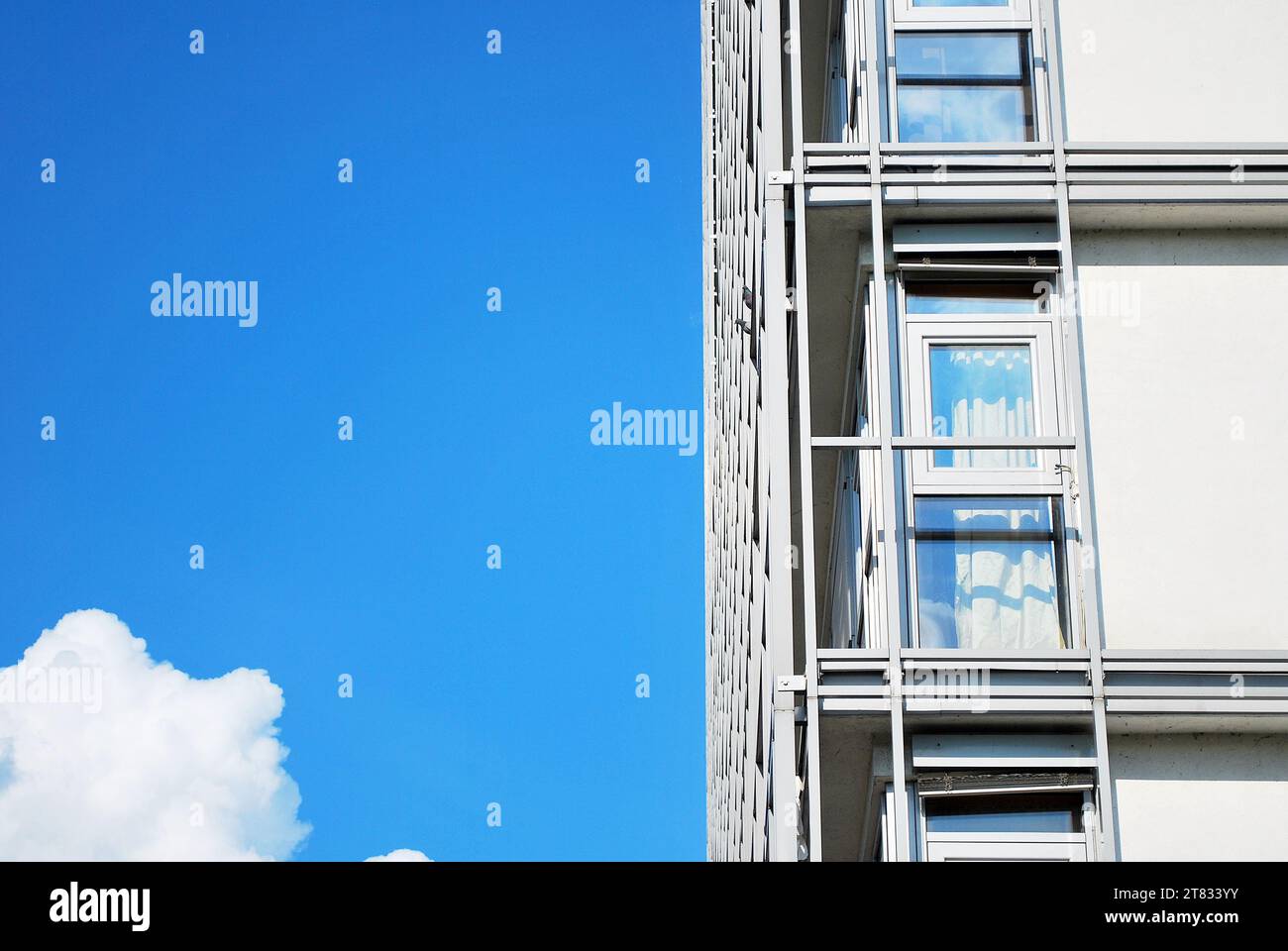 Modern apartment buildings on a sunny day with a blue sky. Facade of a ...