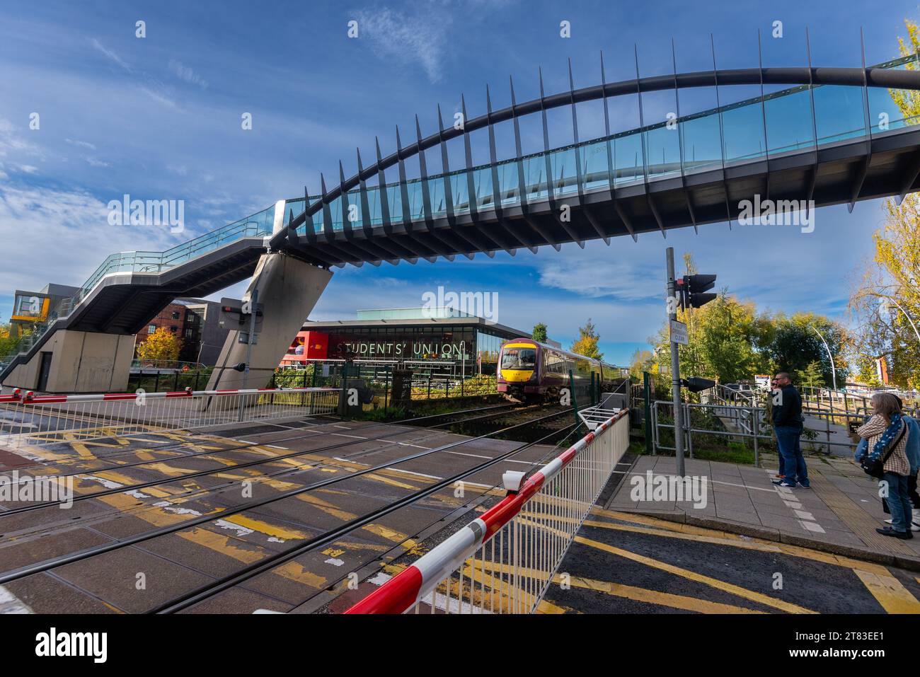 train-crossing-a-level-crossing-as-it-approaches-lincoln-central